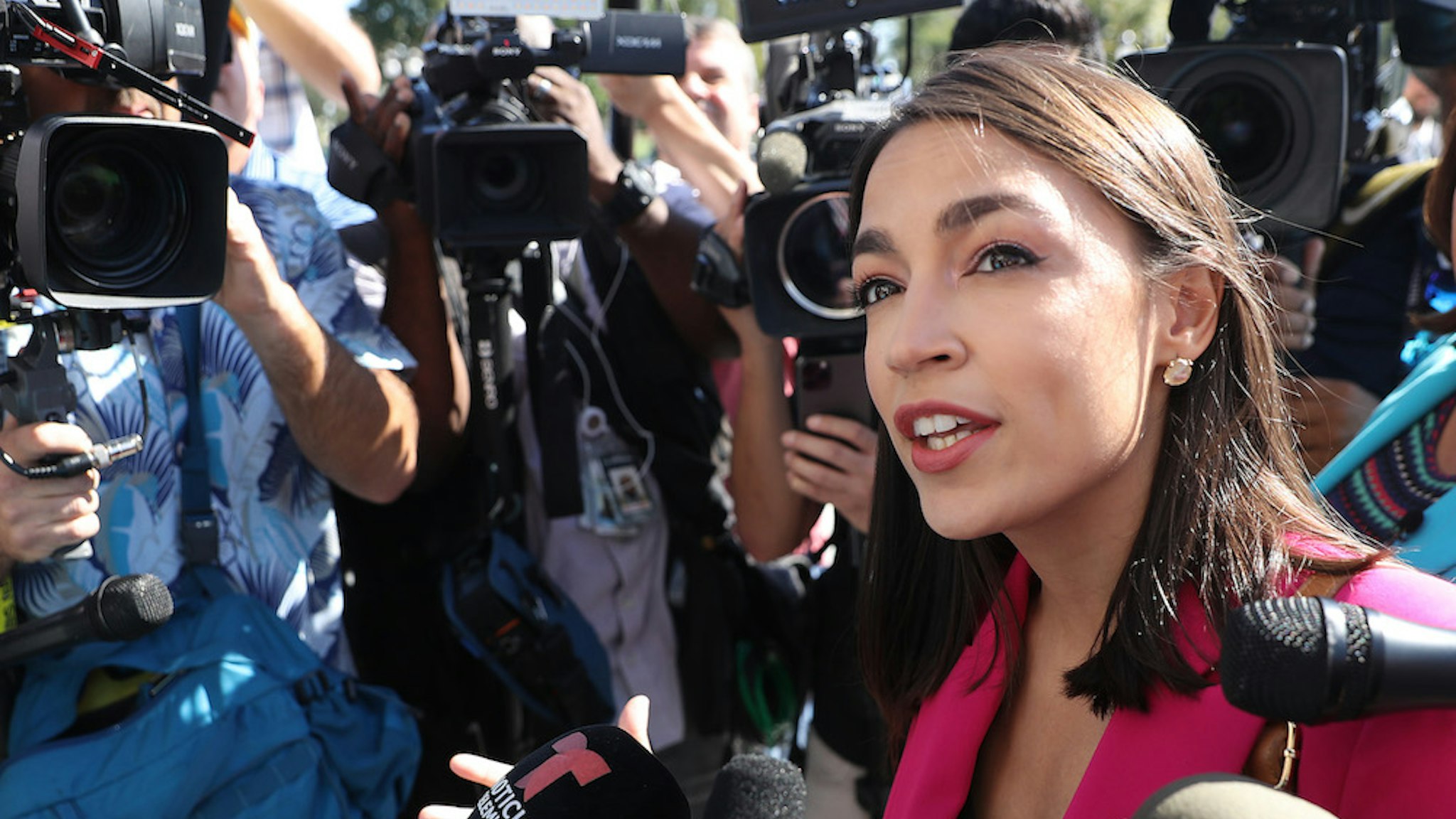 Rep. Alexandria Ocasio-Cortez (D-NY) talks to reporters before heading into the U.S. Capitol Building for final votes before a two-week state work period September 27, 2019 in Washington, DC. Following the release of a whistle-blower complaint claiming abuse of power by President Donald Trump, the House Democratic leadership announced this week that it is launching a formal impeachment inquiry. (Photo by Chip Somodevilla/Getty Images)