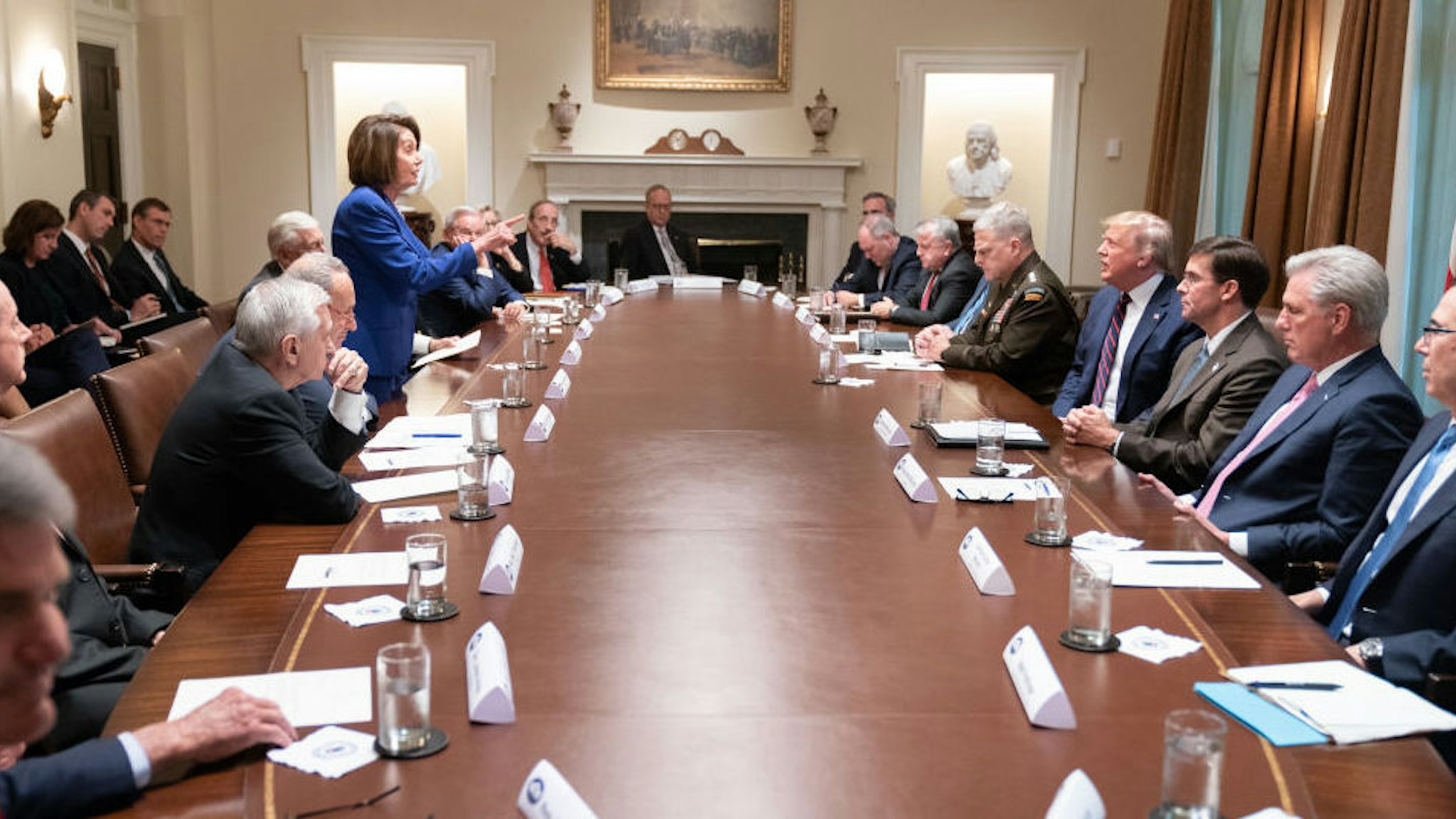 WASHINGTON, DC - OCTOBER 16: In this handout provided by the White House, U.S. President Donald Trump meets with House Speaker Nancy Pelosi and Congressional leadership in the Cabinet Room of the White House October 16, 2019 in Washington, DC. Pelosi later said Trump referred to her as a "third-grade politician.