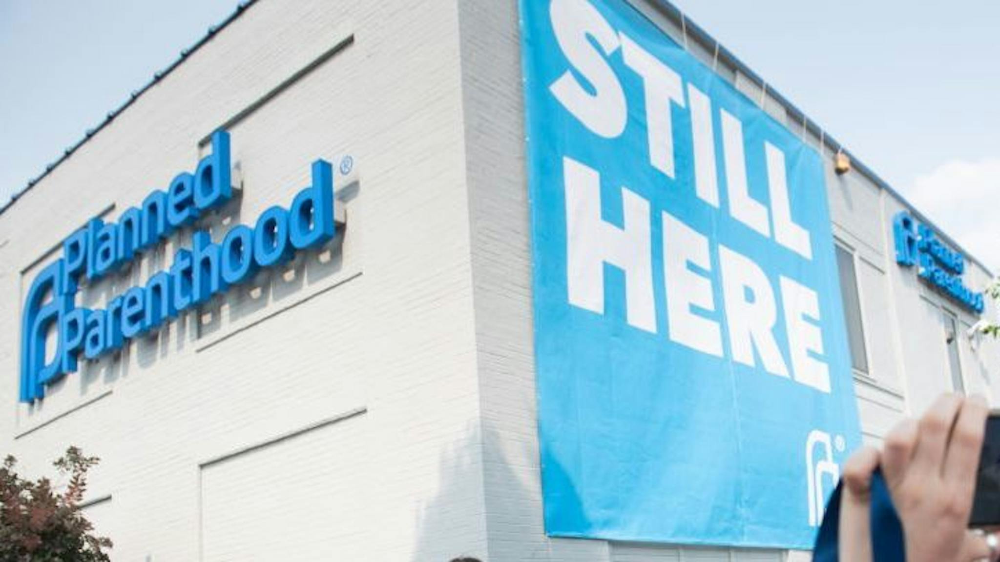 Planned Parenthood Pro-choice supporters pose for photos outside the Planned Parenthood Reproductive Health Services Center in St. Louis, Missouri, May 31, 2019, the last location in the state performing abortions, after a US Court announced the clinic could continue operating. - A US Court on May 31, 2019 blocked Missouri from closing the clinic. (Photo by SAUL LOEB / AFP) (Photo credit should read SAUL LOEB/AFP/Getty Images)