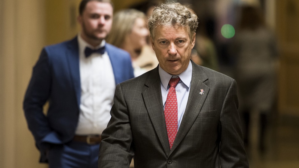 Sen. Rand Paul, R-Ky., walks to the Senate subway after the Senate GOP policy lunch on Tuesday, Nov. 27, 2018.