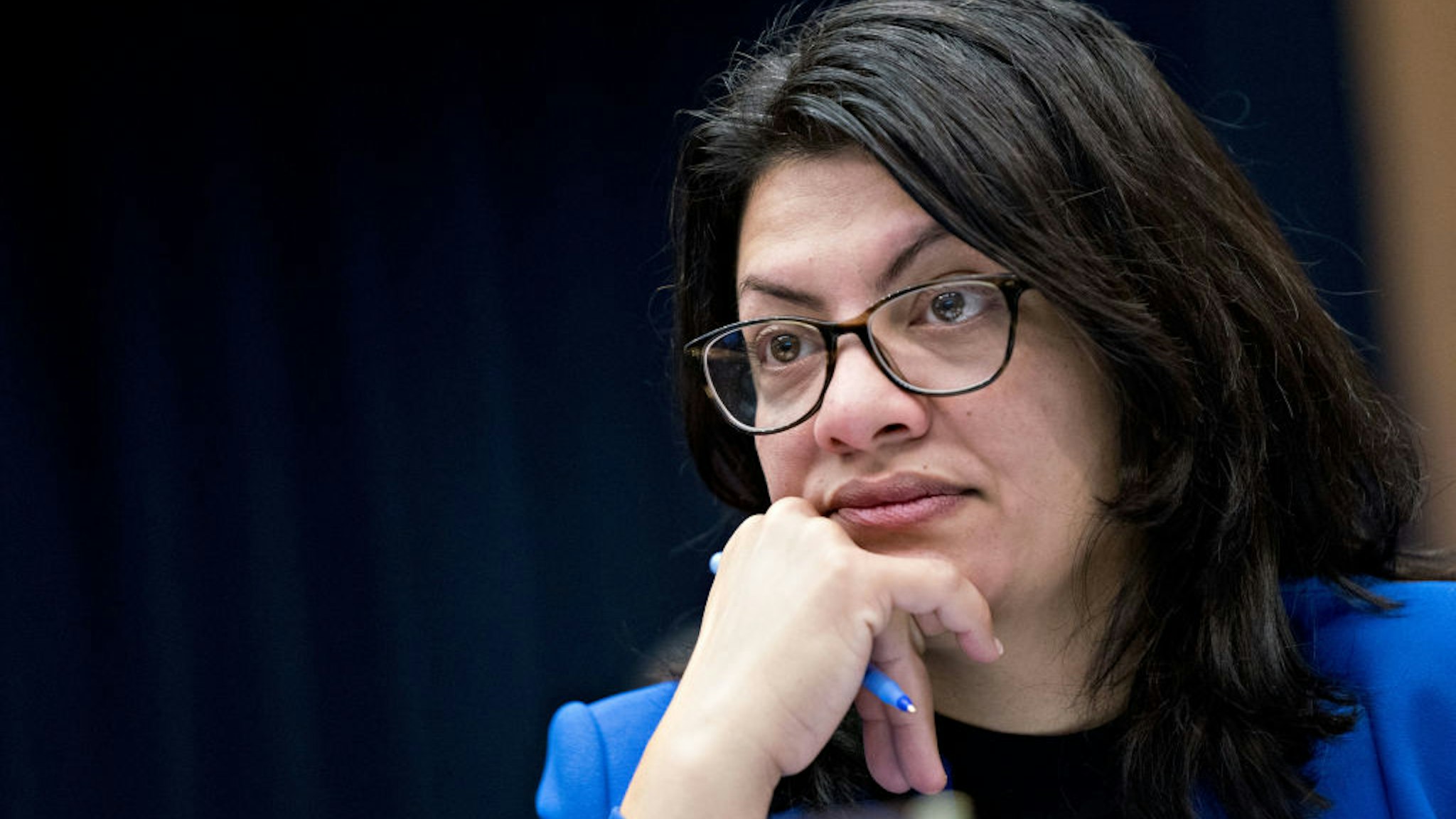 Rashida Tlaib listens during a House Financial Services Committee hearing