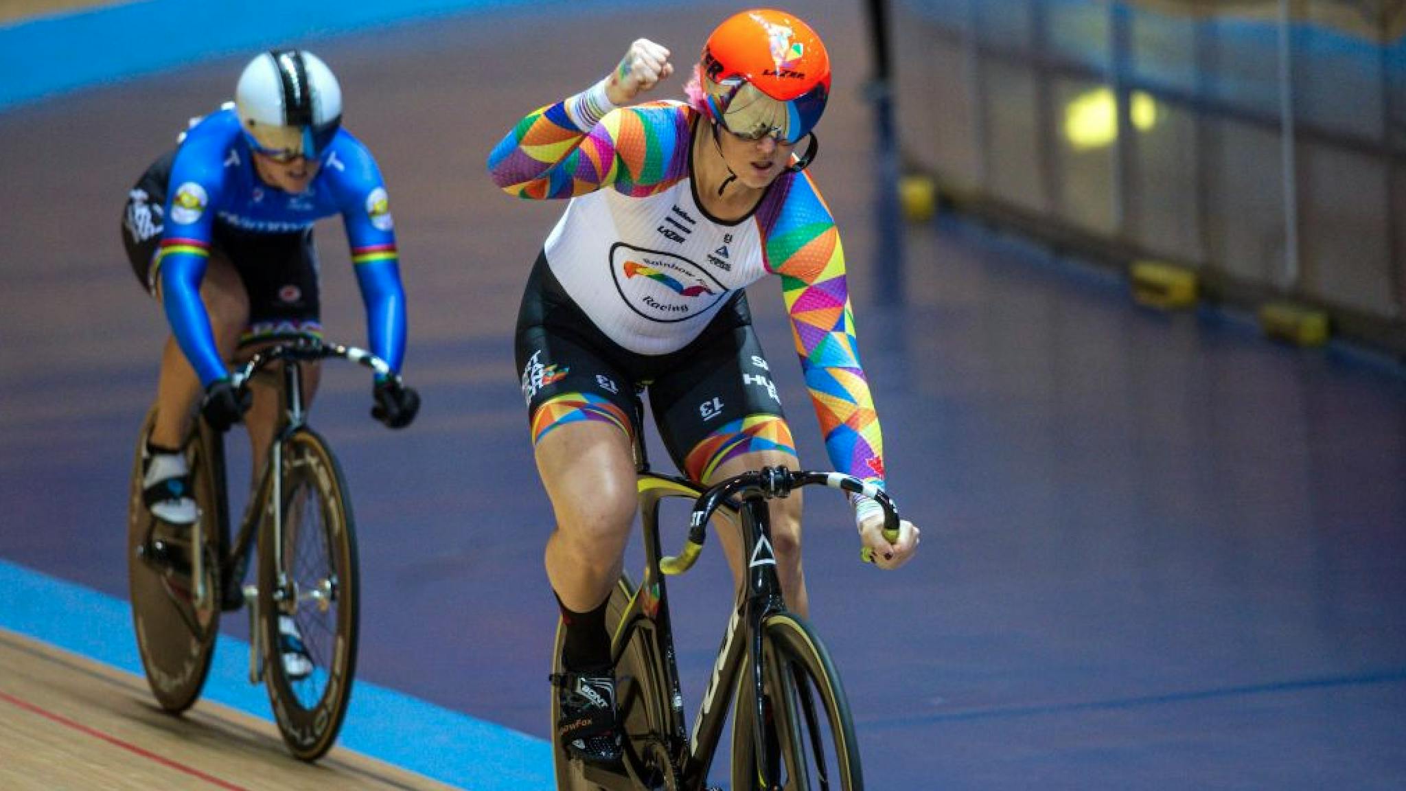 Rachel McKinnon Canadian cyclist Rachel McKinnon (R) celebrates victory over USA's Dawn Orwick in the first race of their F35-39 Sprint Final during the 2019 UCI Track Cycling World Masters Championship, in Manchester on October 19, 2019.