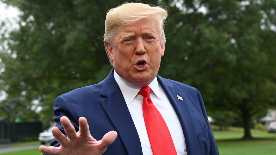 US President Donald Trump speaks to the press as he departs the White House in Washington, DC, for Florida on October 3, 2019.