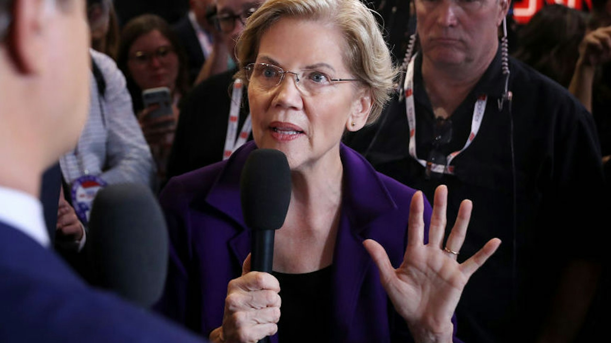 WESTERVILLE, OHIO - OCTOBER 15: Presidential candidate Sen. Elizabeth Warren (D-MA) talks with MSNBC host Chris Hays in the Spin Room following the fourth Democratic presidential debate in the Clements Recreation Center at Otterbein University October 15, 2019 in Westerville, Ohio. A record 12 presidential hopefuls are participating in the debate hosted by CNN and The New York Times.