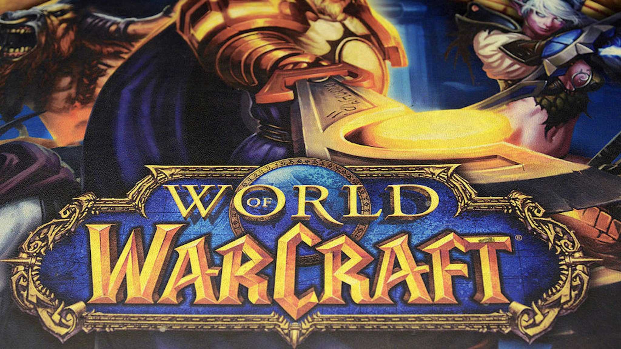 An advertisement for the ''World of Warcraft'' game, produced by Activision Blizzard Inc., a video-game publishing unit of Vivendi SA, is displayed at a store in Paris, France, on Saturday, May 12, 2012. Vivendi SA would stand to boost the lowest valuations of Chief Executive Officer Jean-Bernard Levy's seven-year tenure by breaking up businesses ranging from phone providers to video games and pay television. Photographer: Fabrice Dimier/Bloomberg