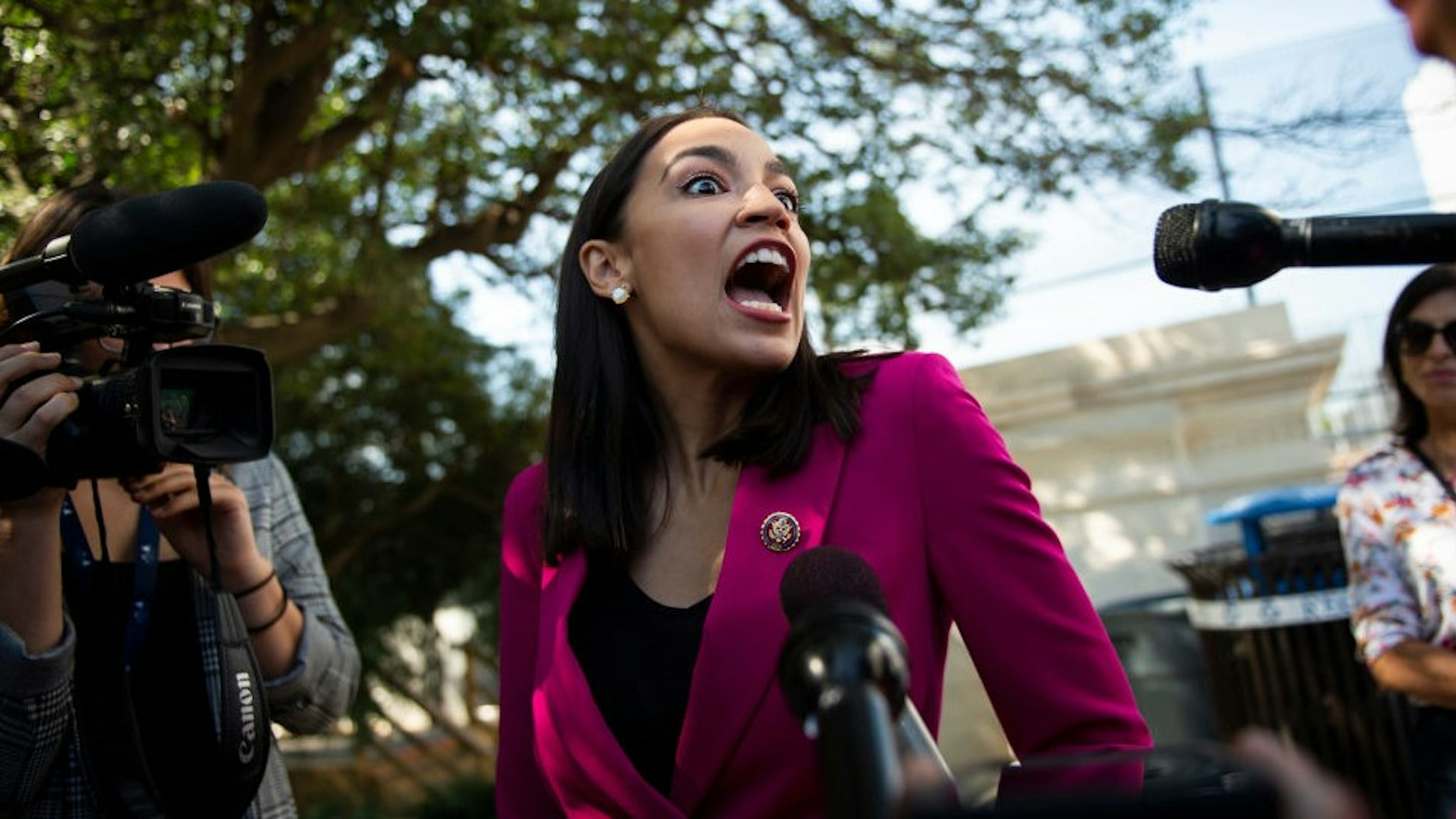 Rep. Alexandria Ocasio-Cortez, D-N.Y., stops to speak with reporters outside of the Capitol after the final votes of the week on Friday, Sept. 27, 2019. (Photo by Caroline Brehman/CQ-Roll Call, Inc via Getty Images)