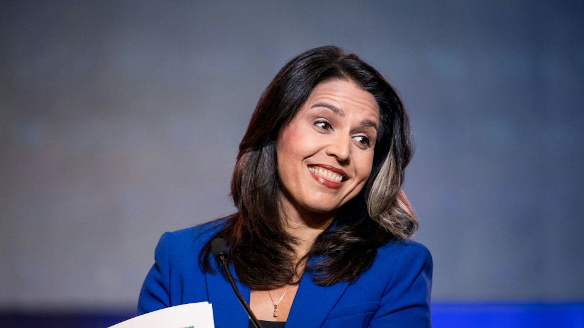 COLUMBIA, SC - JUNE 22: Democratic presidential candidate Rep. Tulsi Gabbard (R-HI) addresses the crowd during the 2019 South Carolina Democratic Party State Convention on June 22, 2019 in Columbia, South Carolina. Democratic presidential hopefuls are converging on South Carolina this weekend for a host of events where the candidates can directly address an important voting bloc in the Democratic primary.