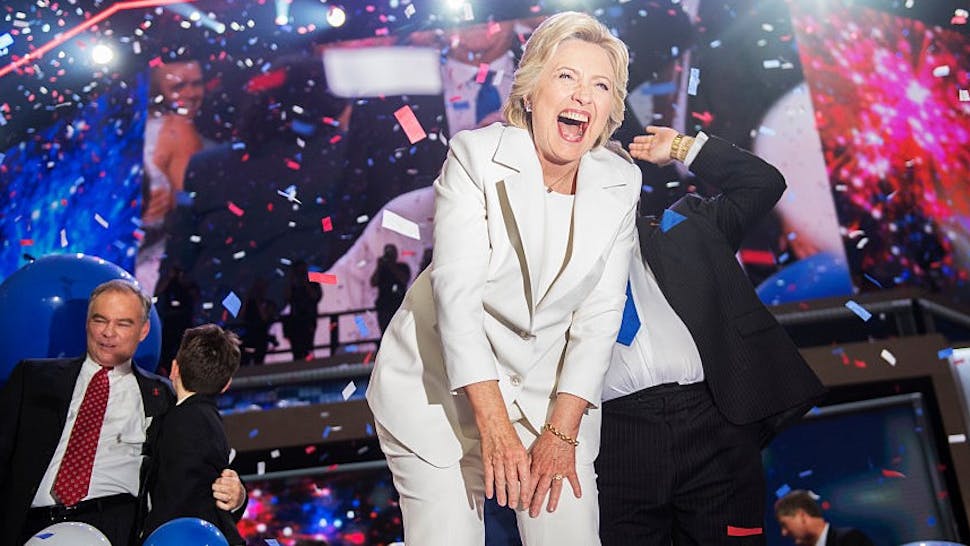 Democratic National Convention Democratic presidential nominee Hillary Clinton and her running mate Tim Kaine, left, celebrate at the Wells Fargo Center in Philadelphia, Pa., on the final night of the Democratic National Convention, July 28, 2016. (Photo By Tom Williams/CQ Roll Call)