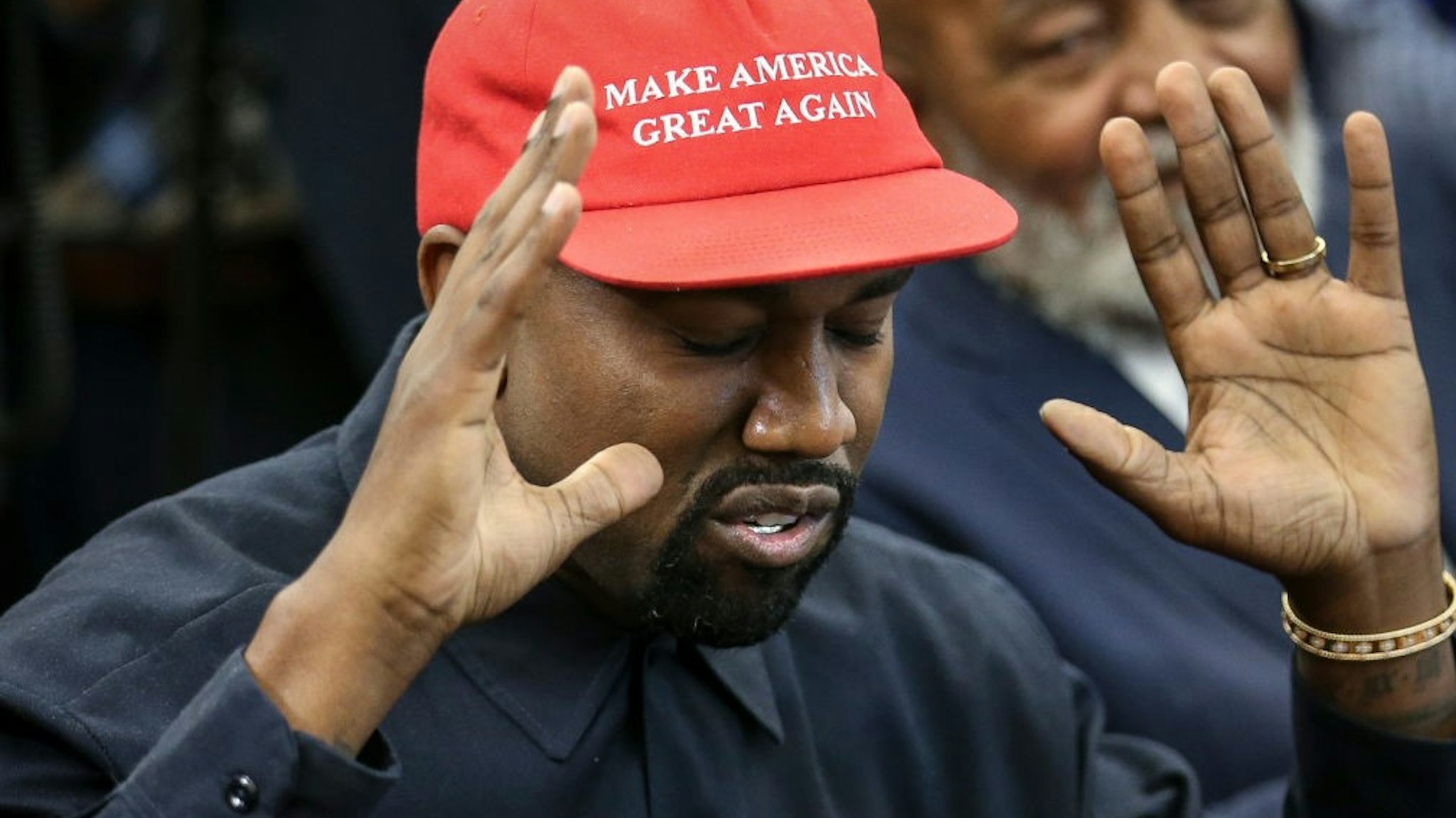 Rapper Kanye West speaks during a meeting with U.S. President Donald Trump in the Oval office of the White House on October 11, 2018 in Washington, DC. (Photo by Oliver Contreras - Pool/Getty Images)