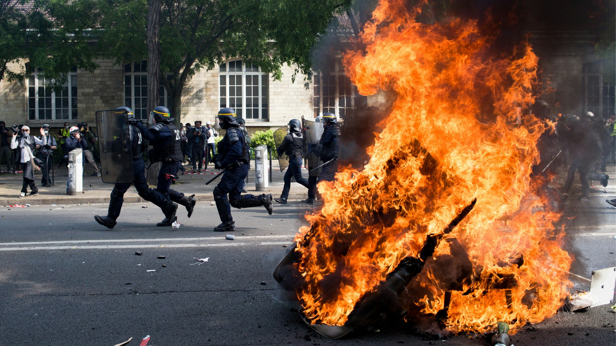 Police forces are charging demonstrators during the inter-union demonstration on May 1 in Paris, which also includes yellow vests, in Paris, France, on May 1, 2019.