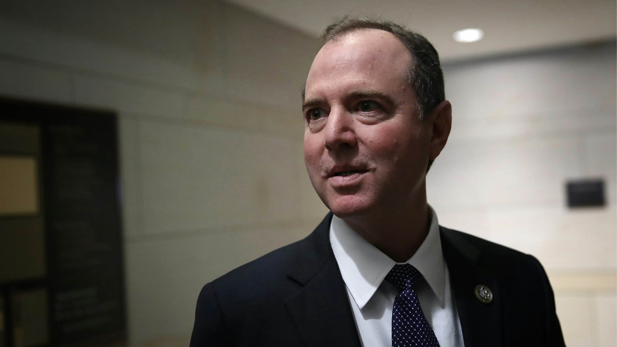 Rep. Adam Schiff (D-CA), ranking member of the House Permanent Select Committee on Intelligence, answers brief questions from the media while boarding an elevator at the U.S. Capitol February 5, 2018 in Washington, DC.