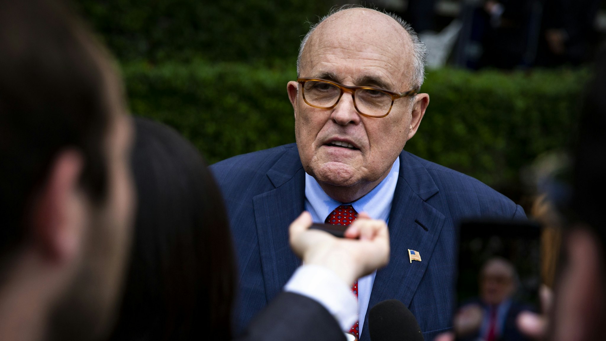 Rudy Giuliani, former mayor of New York, speaks with reporters during the White House Sports and Fitness Day event on the South Lawn of the White House in Washington, D.C., U.S., on Wednesday, May 30, 2018.