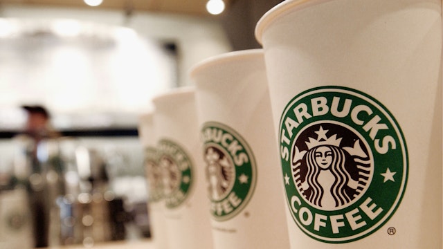 Beverage cups featuring the logo of Starbucks Coffee are seen in the new flagship store on 42nd Street August 5, 2003 in New York City.