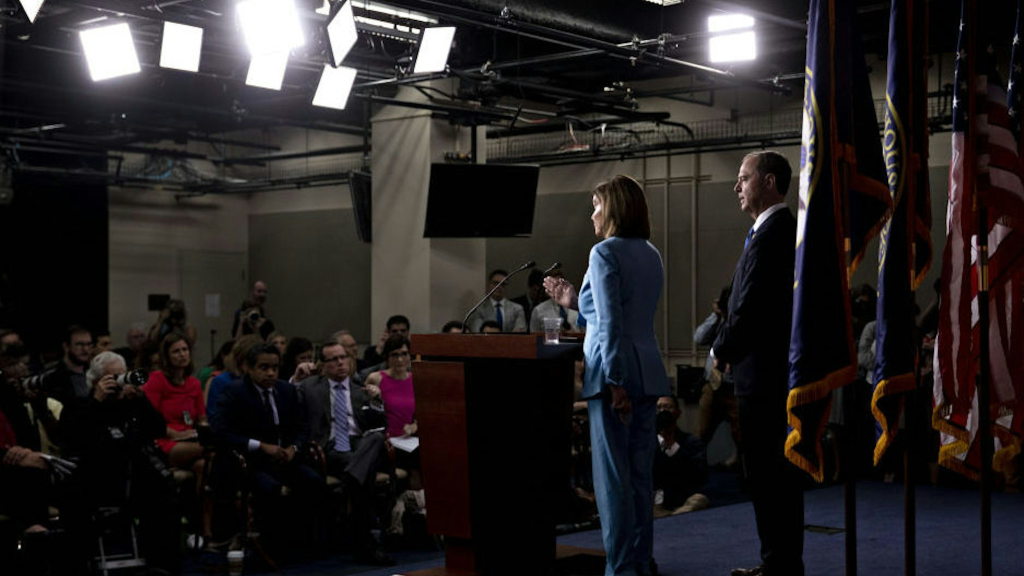U.S. House Speaker Nancy Pelosi, a Democrat from California, center, speaks as Representative Adam Schiff, a Democrat from California and chairman of the House Intelligence Committee, center right., listens during a news conference on Capitol Hill in Washington, D.C., U.S., on Wednesday, Oct. 2, 2019. Three House committee chairmen threatened on Wednesday to subpoena the White House if it fails to adhere by Friday to document requests related to allegations that President Donald Trump pressured Ukraine into investigating one of his leading political rivals.