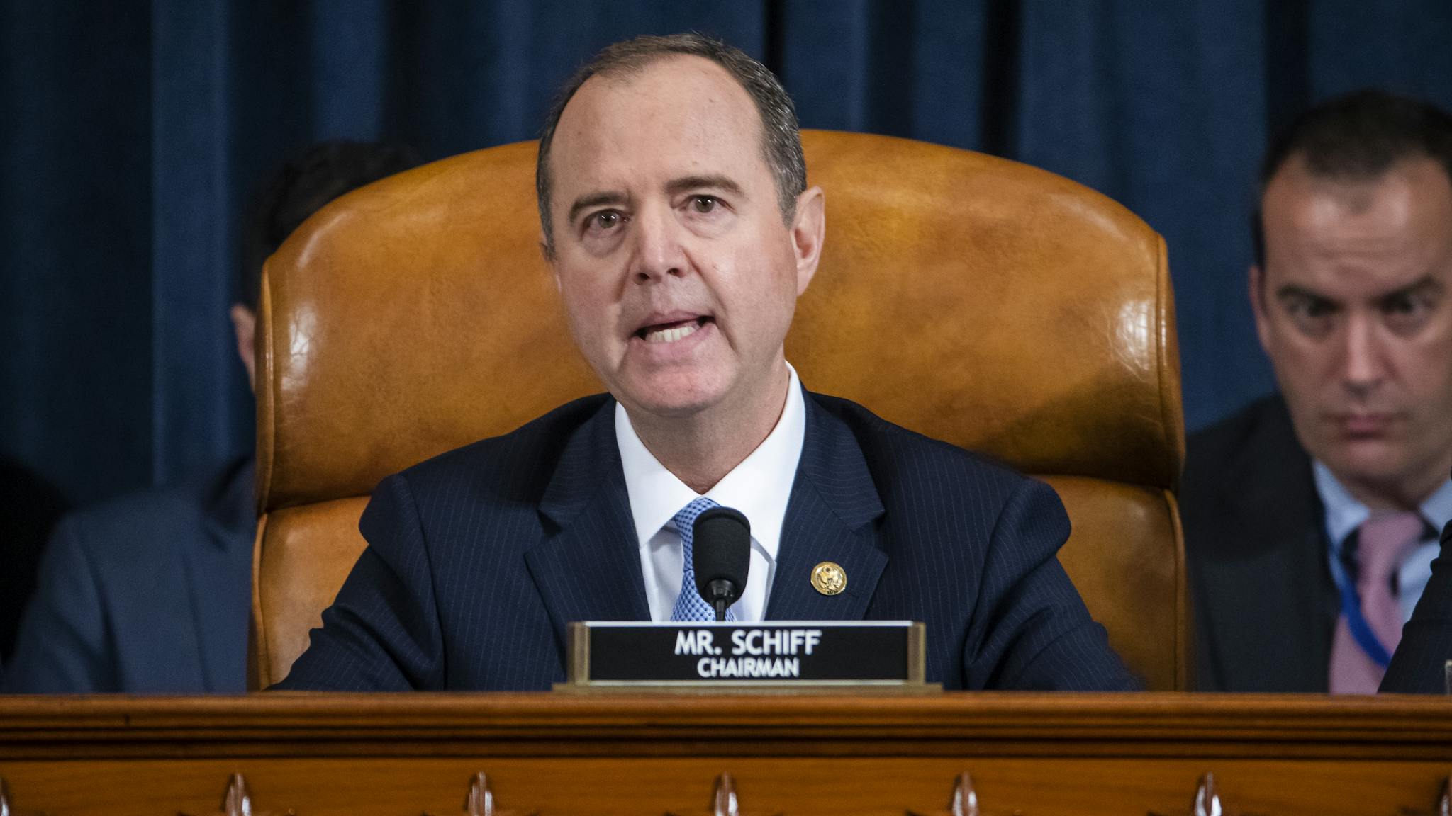 Adam Schiff WASHINGTON, DC - NOVEMBER 13: Democratic Chairman of the House Permanent Select Committee on Intelligence Adam Schiff speaks to charge d'Affaires at the US embassy in Ukraine Bill Taylor and Deputy Assistant Secretary of State for Europe and Eurasia George Kent during the House Permanent Select Committee on Intelligence hearing on the impeachment inquiry into US President Donald J. Trump, on Capitol Hill November 13, 2019 in Washington, DC. In the first public impeachment hearings in more than two decades, House Democrats are trying to build a case that President Donald Trump committed extortion, bribery or coercion by trying to enlist Ukraine to investigate his political rival in exchange for military aide and a White House meeting that Ukraine President Volodymyr Zelensky sought with Trump.