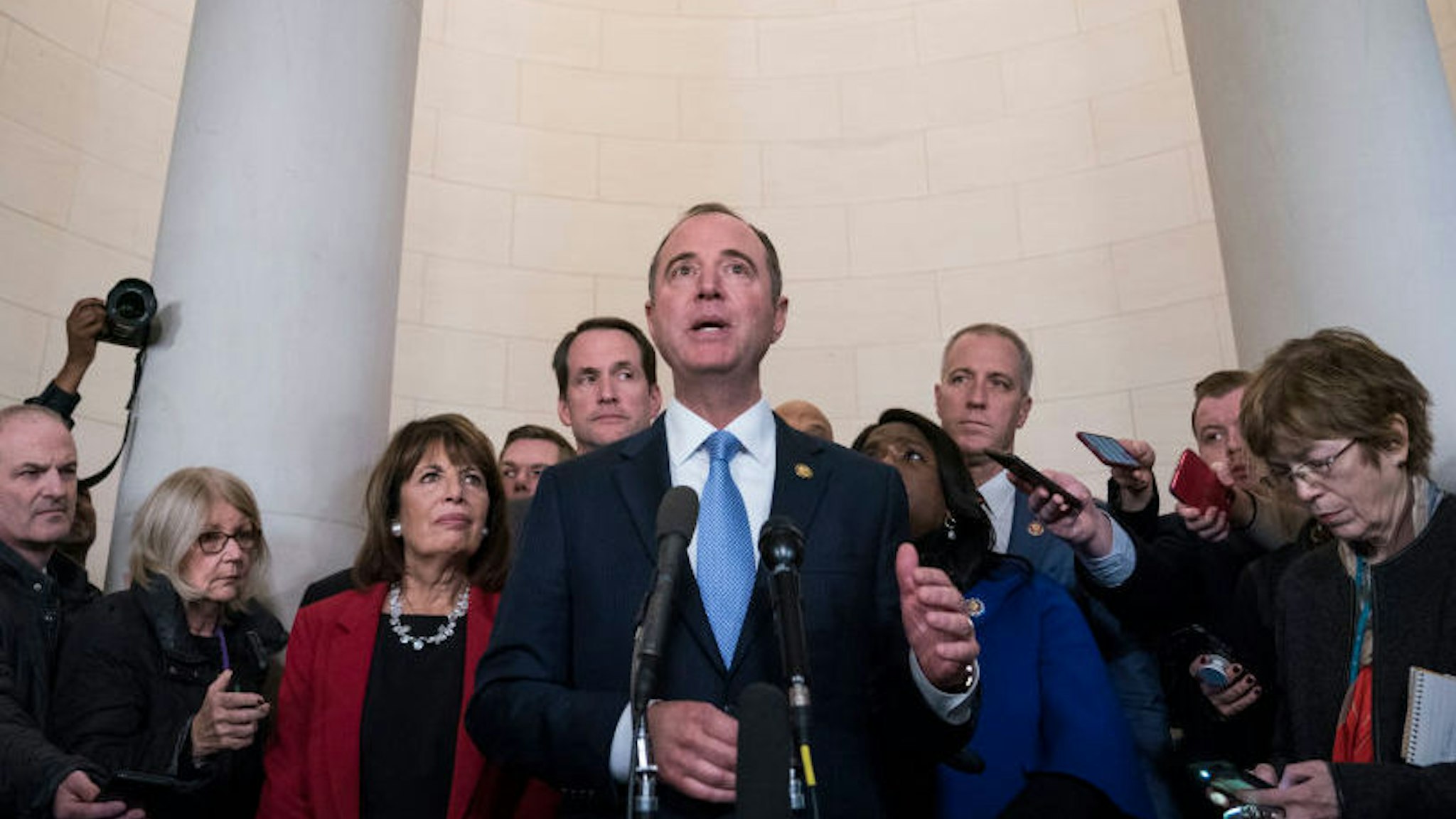 Representative Adam Schiff, a Democrat from California and chairman of the House Intelligence Committee, answers questions from members of the media after a House Intelligence Committee impeachment inquiry hearing in Washington, D.C., U.S., on Wednesday, Nov. 13, 2019. In the first public impeachment hearings in more than two decades, House Democrats are trying to build a case that President Donald Trump committed extortion, bribery or coercion by trying to enlist Ukraine to investigate his political rival in exchange for military aide and a White House meeting that Ukraine President Volodymyr Zelensky sought with Trump. (Photo by Sarah Silbiger/Getty Images)