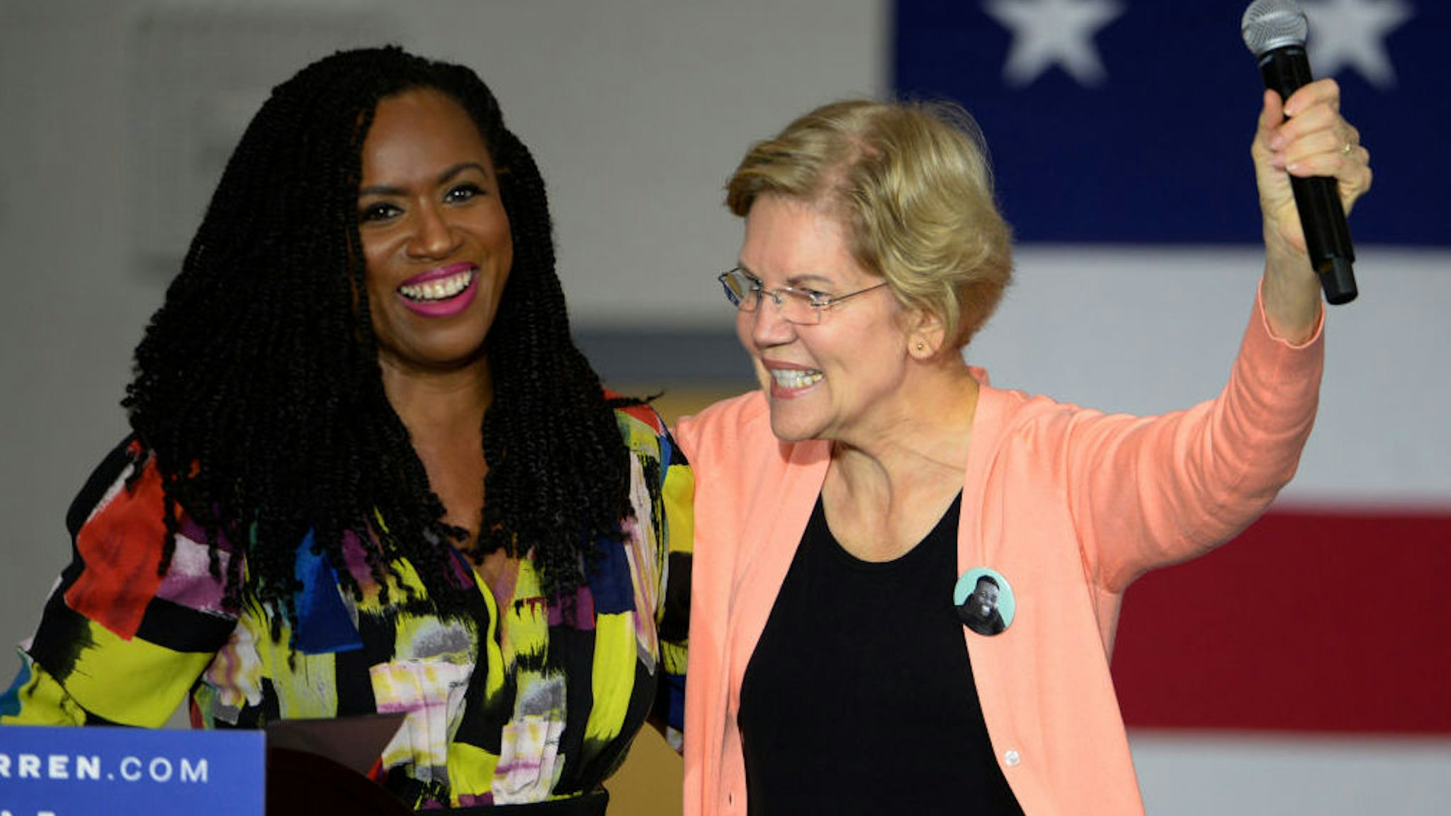 RALEIGH, NC - NOVEMBER 07: Rep. Ayanna Pressley (D-MA), left, endorses Democratic presidential candidate Sen. Elizabeth Warren (D-MA) during a campaign stop at Broughton High School on November 7, 2019 in Raleigh, North Carolina. Pressley broke from the ÒsquadÓ to endorse Warren. (