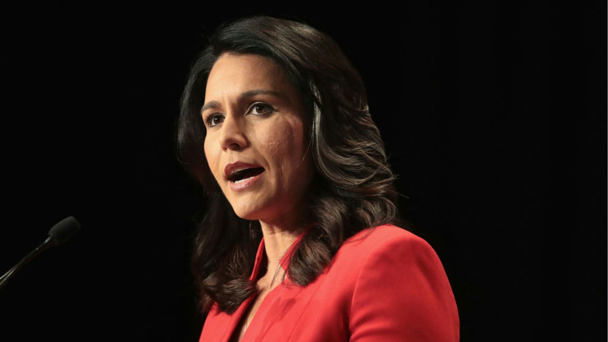 Democratic presidential candidate and Hawaii congresswoman Tulsi Gabbard speaks at the Iowa Democratic Party's Hall of Fame Dinner on June 9, 2019 in Cedar Rapids, Iowa.