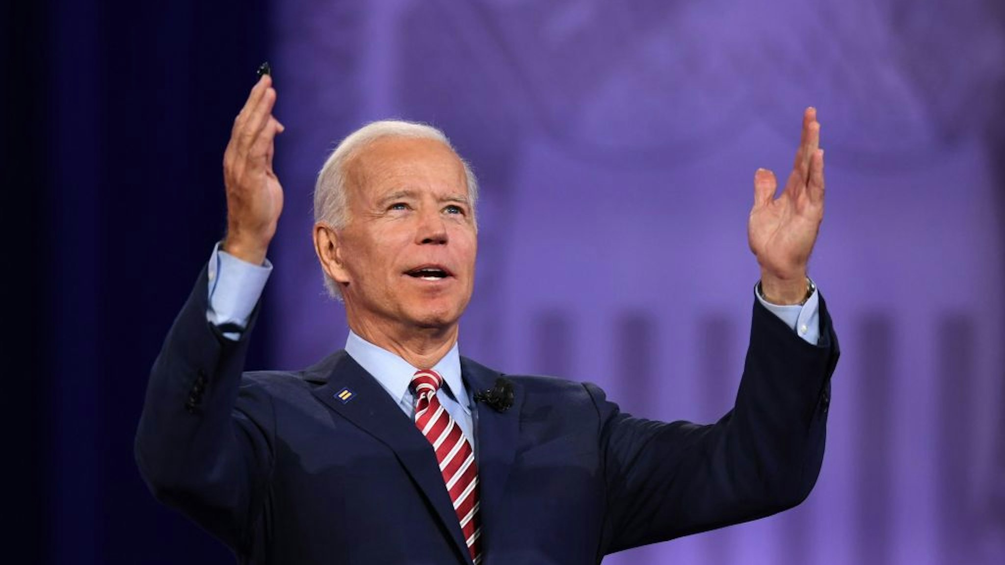 Joe Biden gestures as he speaks during a town hall devoted to LGBTQ issues