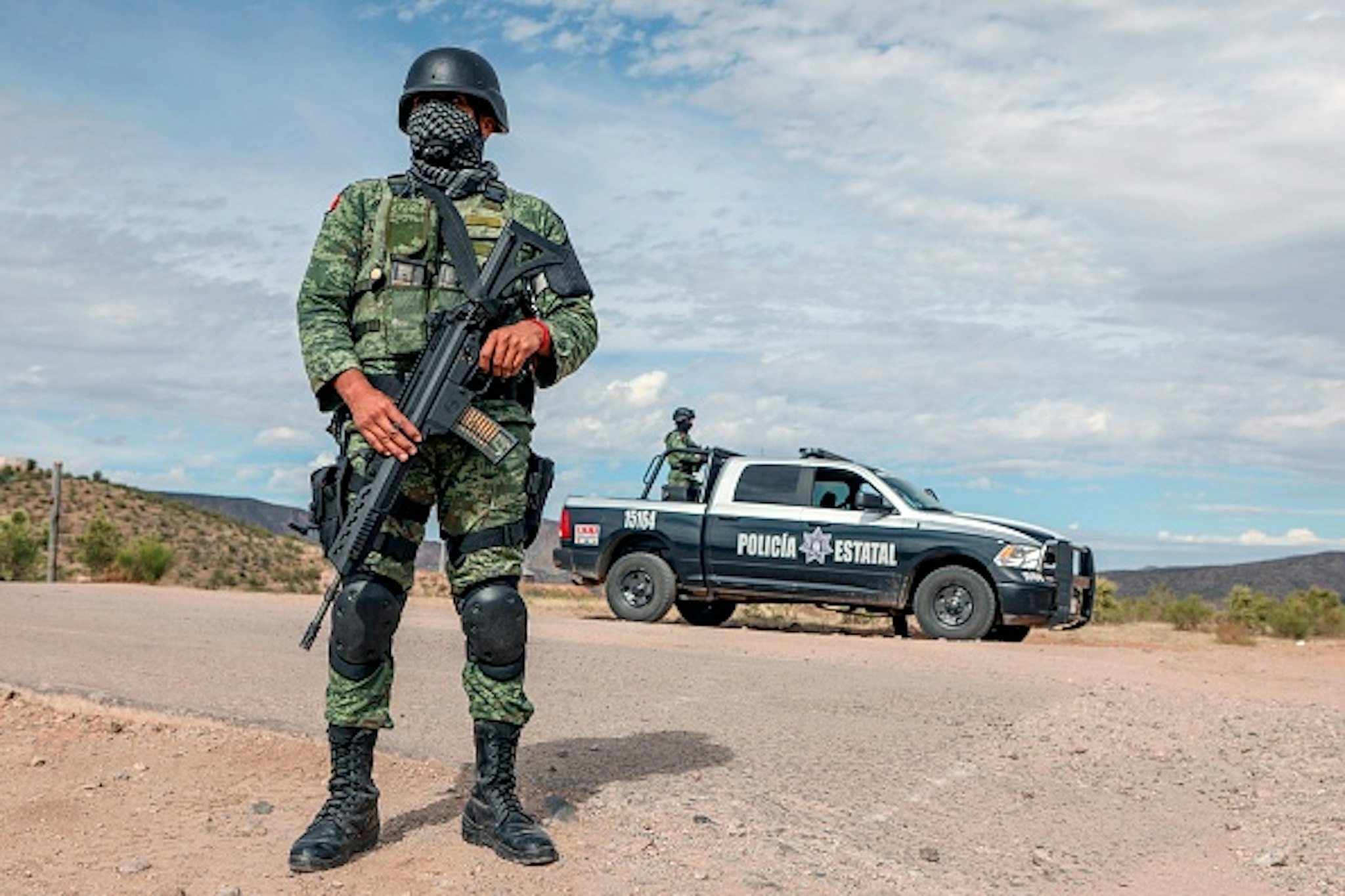 Members of the National Guard stand guard near La Morita ranch, belonging to the Mexican-American LeBaron family -of which nine members were killed in a hail of bullets on November 4- in Bavispe, Sonora state, Mexico, on November 6, 2019. - Mexican authorities said Wednesday they believe a drug cartel called "La Linea" was responsible for the murder of the three women and six children, saying the massacre was committed with American-made ammunition. Eight other children managed to escape, six of them wounded.