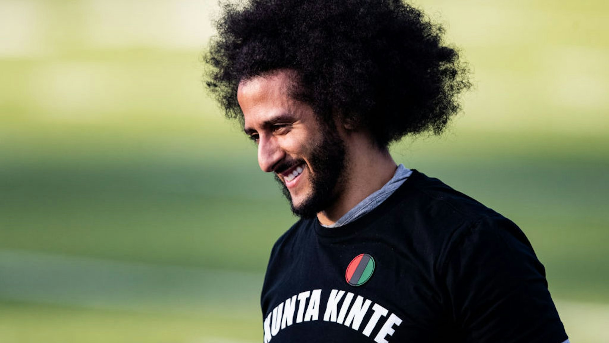 Colin Kaepernick looks on during his NFL workout held at Charles R Drew high school on November 16, 2019 in Riverdale, Georgia. (Photo by Carmen Mandato/Getty Images)