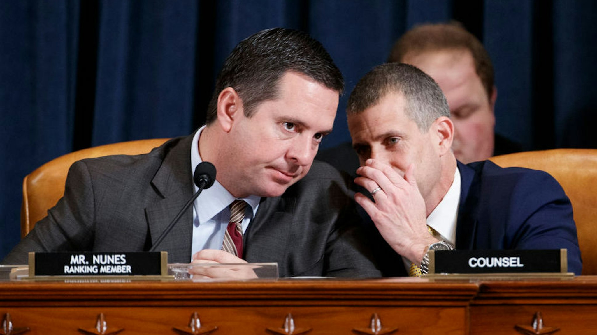 Ranking member of the House Permanent Select Committee on Intelligence Devin Nunes (L) talks with minority legal counsel Steve Castor (R) during the House Permanent Select Committee on Intelligence public hearing on the impeachment inquiry into US President Donald J. Trump, on Capitol Hill in Washington, DC, USA, 19 November 2019. The impeachment inquiry is being led by three congressional committees and was launched following a whistleblower's complaint that alleges US President Donald J. Trump requested help from the President of Ukraine to investigate a political rival, Joe Biden and his son Hunter Biden.