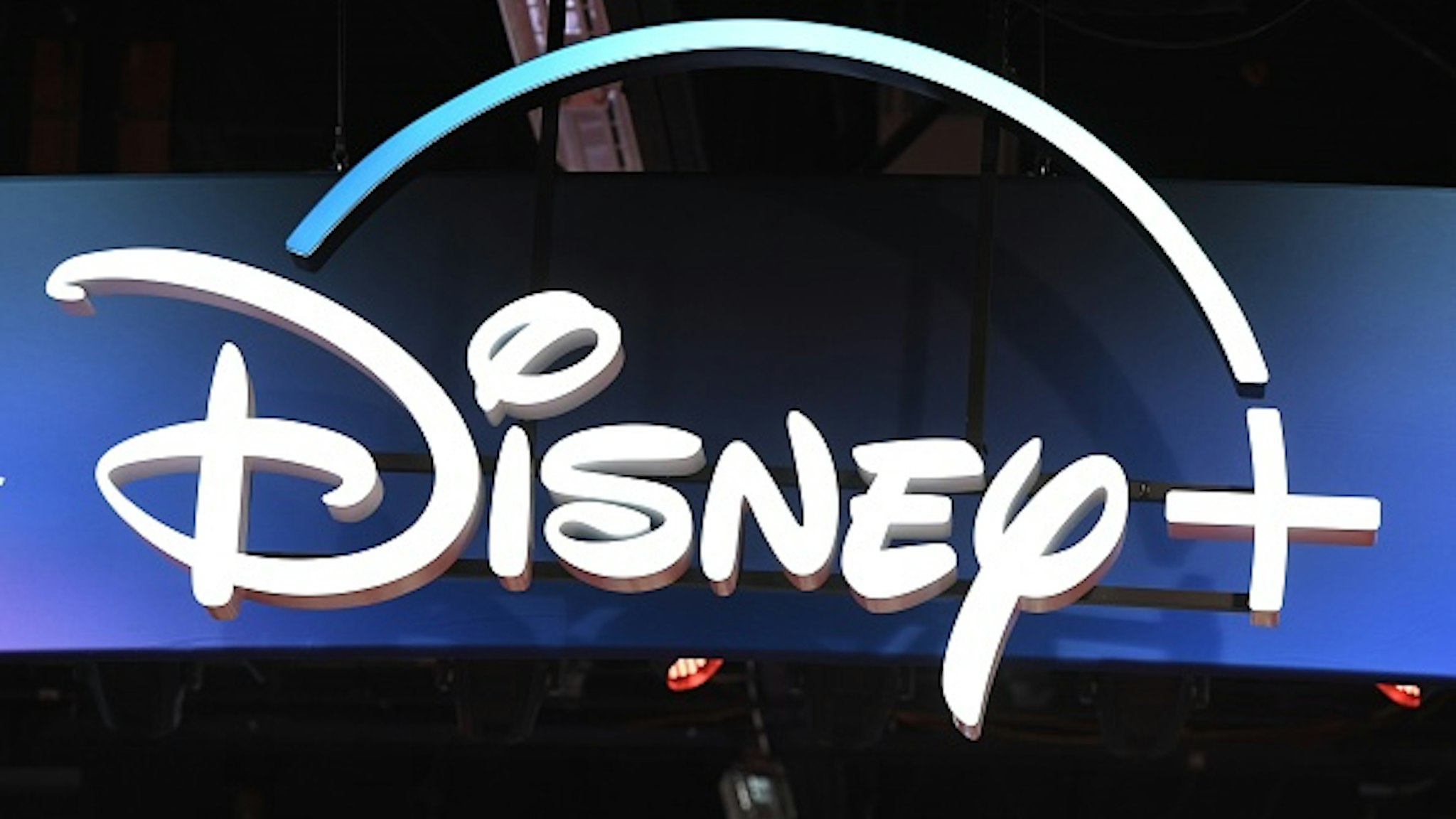 A Disney+ streaming service sign is pictured at the D23 Expo, billed as the "largest Disney fan event in the world," on August 23, 2019 at the Anaheim Convention Center in Anaheim, California. - Disney Plus will launch on November 12 and will compete with out streaming services such as Netflix, Amazon, HBO Now and soon Apple TV Plus.