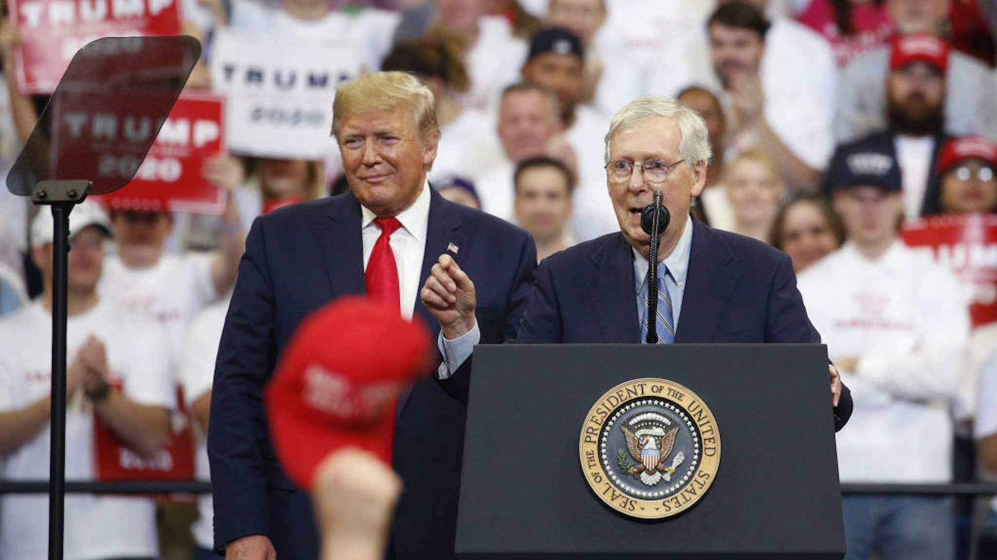Senate Majority Leader Mitch McConnell, a Republican from Kentucky, right, speaks during a rally with U.S. President Trump in Lexington, Kentucky, U.S., on Monday, Nov. 4, 2019. President Trump encouraged his supporters in Kentucky to vote Tuesday to re-elect the state’s Republican governor, declaring it would send a message to congressional Democrats conducting an impeachment inquiry. Photographer: Luke Sharrett/Bloomberg
