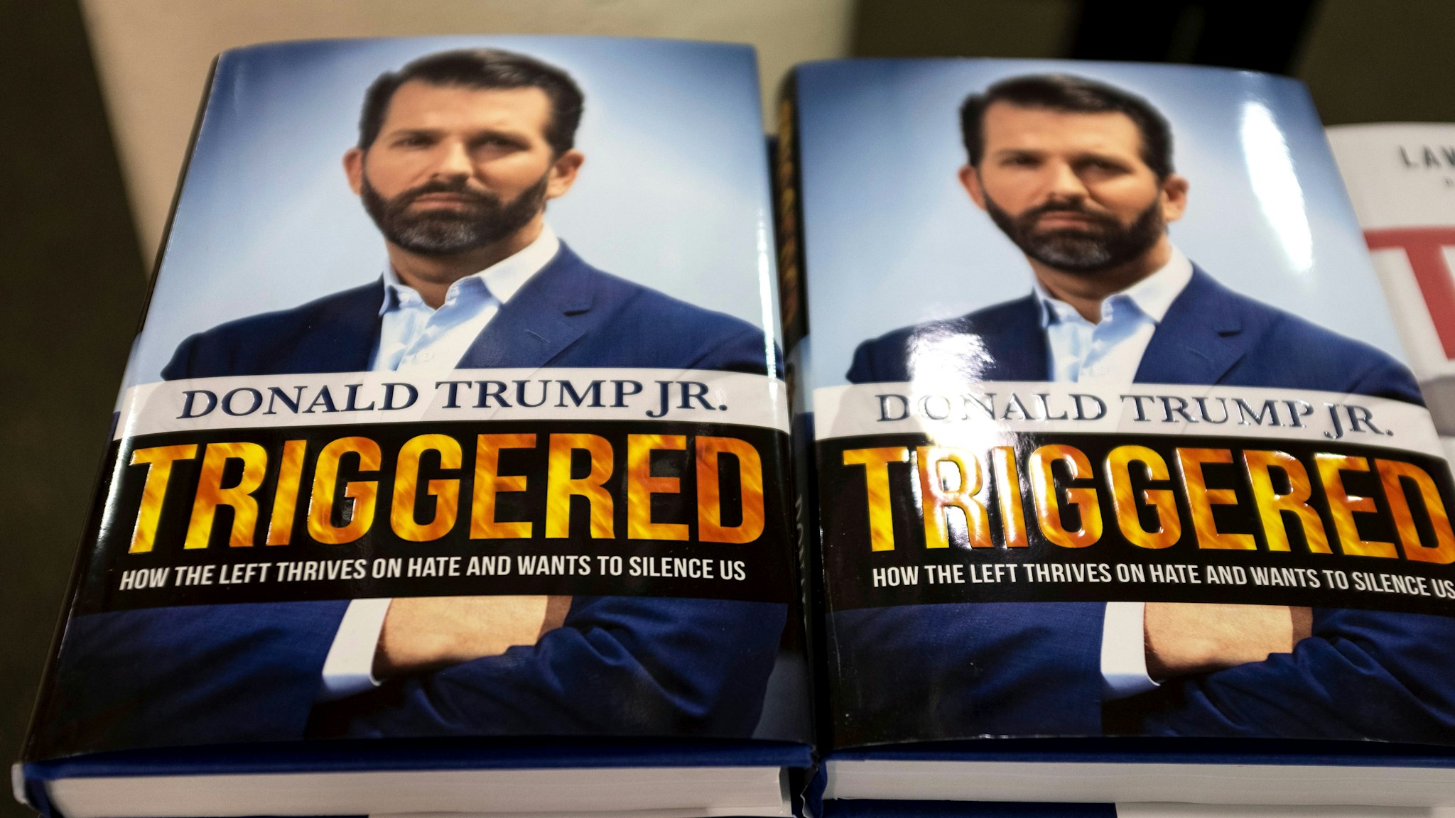 The book "Triggered: How the Left Thrives on Hate and Wants to Silence US," by Donald Trump Jr. is viewed in a bookstore in Manhattan on November 5, 2019 in New York City. - Donald Trump Jr. released a book Tuesday that rails against the left as he admitted he had caught the political bug and may consider running for office in the future. In "Triggered: How the Left Thrives on Hate and Wants to Silence US," the president's son fiercely defends his father and slams mainstream media and political opponents including Hillary Clinton.
