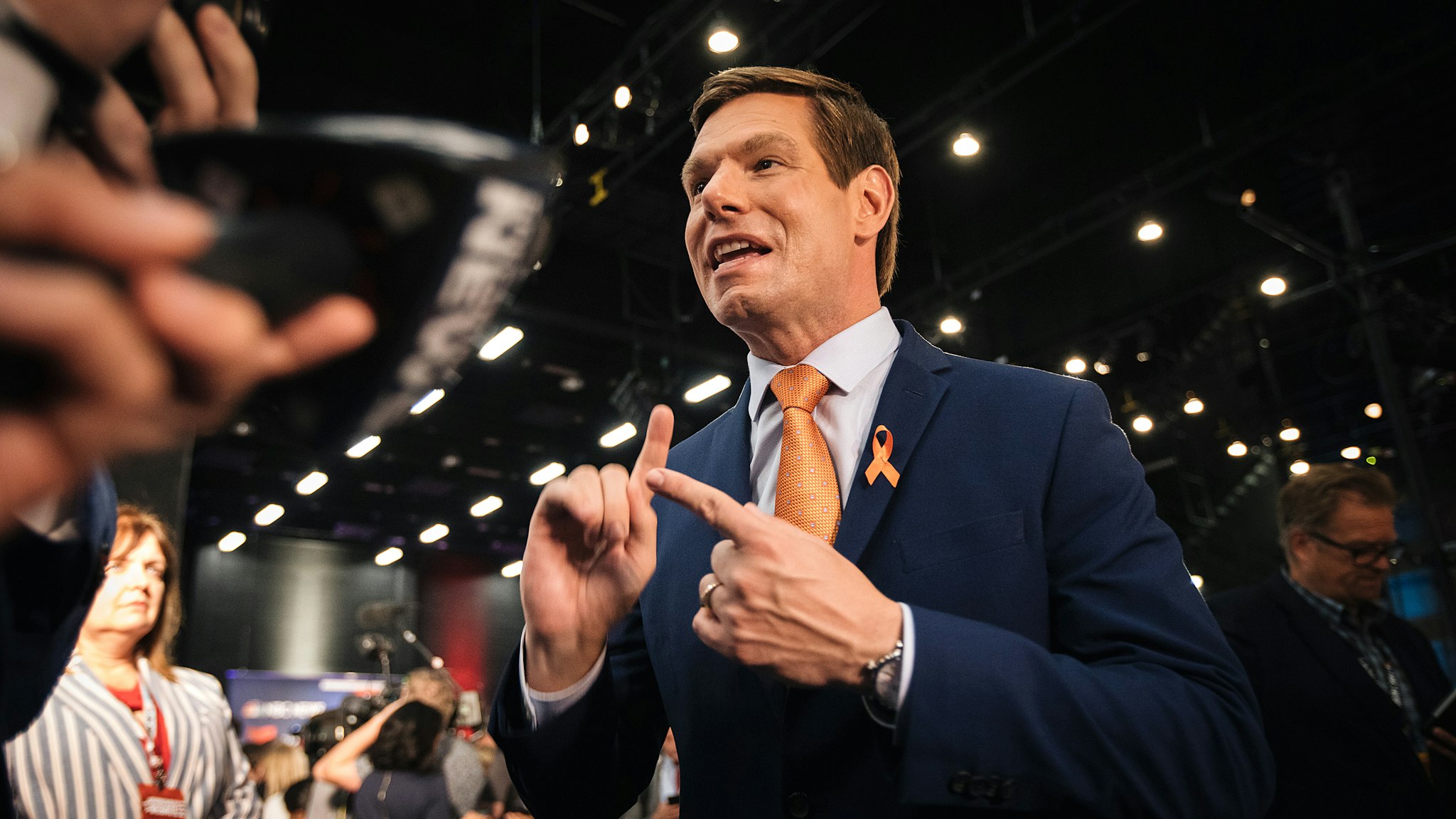 Representative Eric Swalwell, a Democrat from California and 2020 presidential candidate, speaks to the media following the Democratic presidential candidate debate in Miami, Florida, U.S., on Thursday, June 27, 2019. The candidates running for the Democratic presidential nomination rallied around the idea of a government-run Medicare option Thursday night, disagreeing only over whether to make it an option or put all Americans in the program.