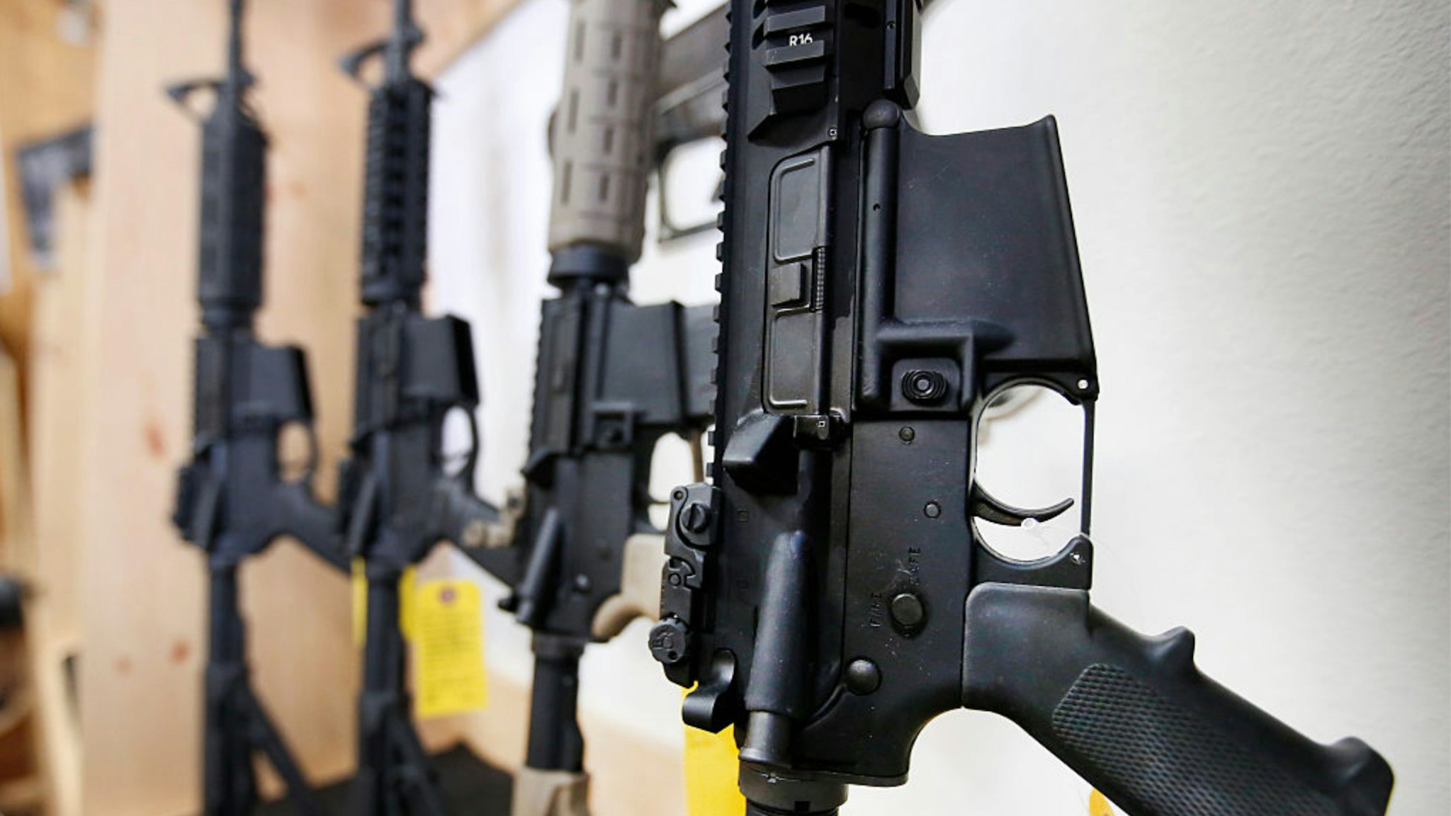 AR-15 semi-automatic guns are on display for sale at Action Target on June 17, 2016 in Springville, Utah.