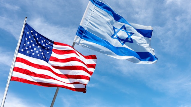 United States and Israel flags near the American Embassy in Jerusalem, Israel