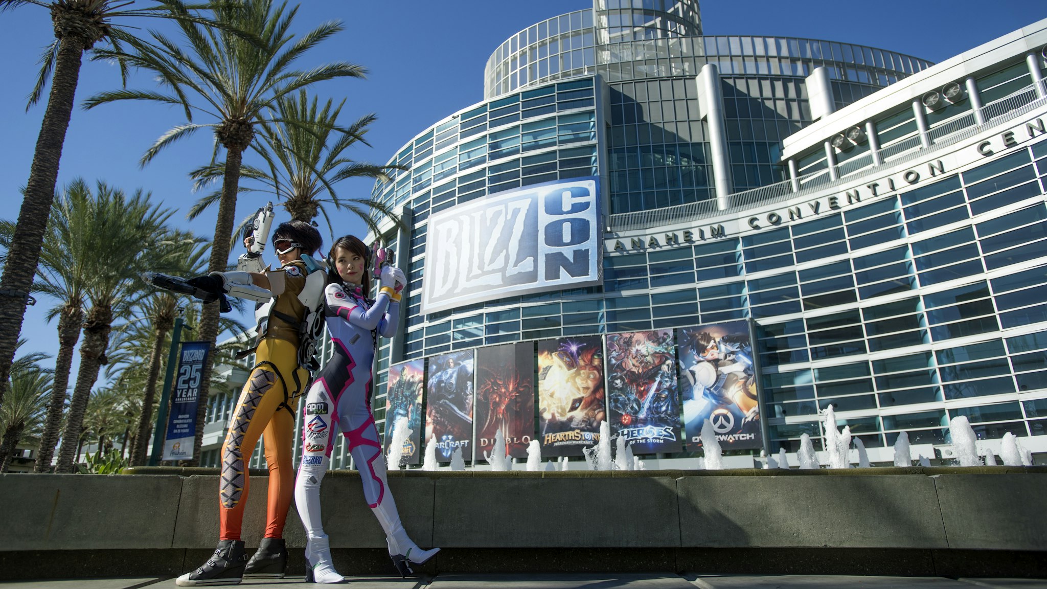 Yayin Chan, dressed as Tracer from the video game Overwathc, left, and Chun Tin Kuo, dressed as D.Va, posed for pictures during Blizzcon in Anaheim, California, November 4, 2016. Blizzcon is the annual gaming convention for Blizzard Entertainment, based in Irvine. (Photo by Jeff Gritchen/Digital First Media/Orange County Register via Getty Images)