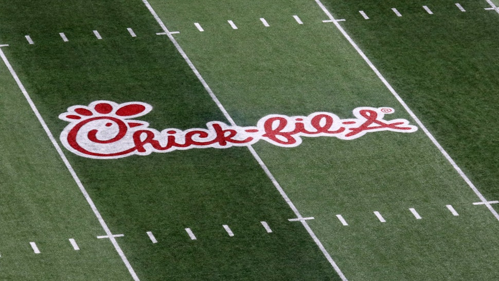 ATLANTA, GA - DECEMBER 29: The Chick-fil-A logo is painted on the field for the Peach Bowl between the Florida Gators and the Michigan Wolverines on December 29, 2018 at Mercedes-Benz Stadium in Atlanta, Georgia.