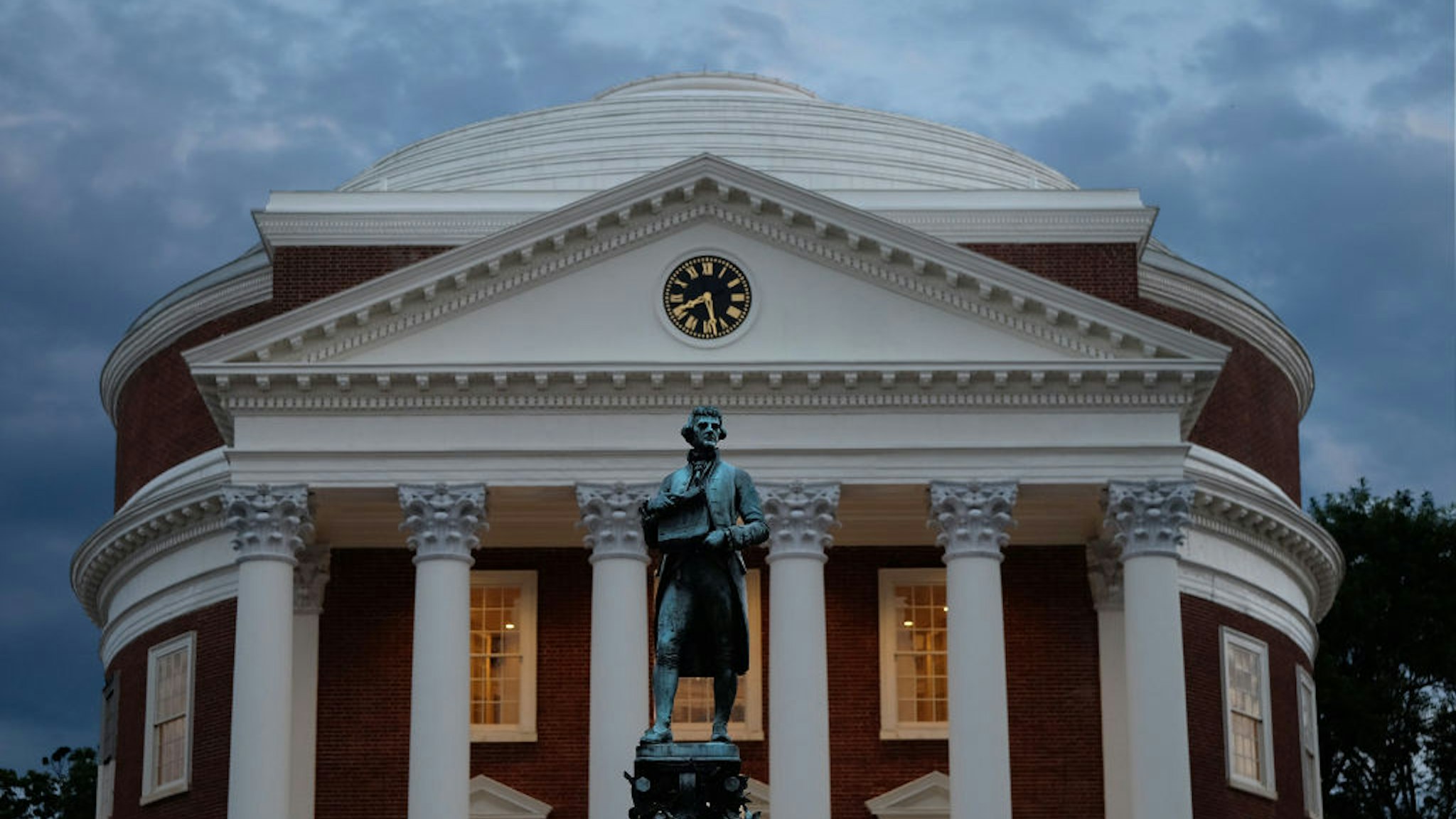 A statue of Thomas Jefferson stands in front of the Rotunda at the University of Virginia, Friday June 10, 2016.