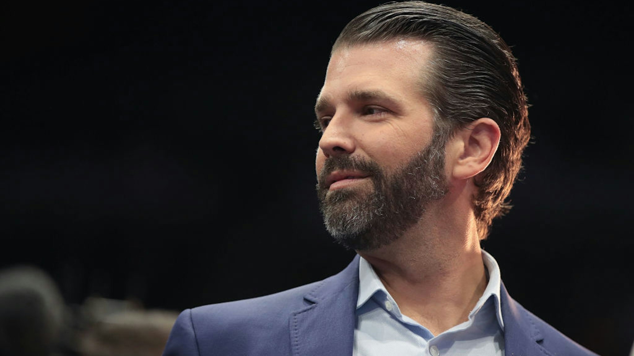 MARCH 28: Donald Trump Jr. talks to the press before the arrival of his father President Donald Trump during a rally at the Van Andel Arena on March 28, 2019 in Grand Rapids, Michigan. Grand Rapids was the final city Trump visited during his 2016 campaign.