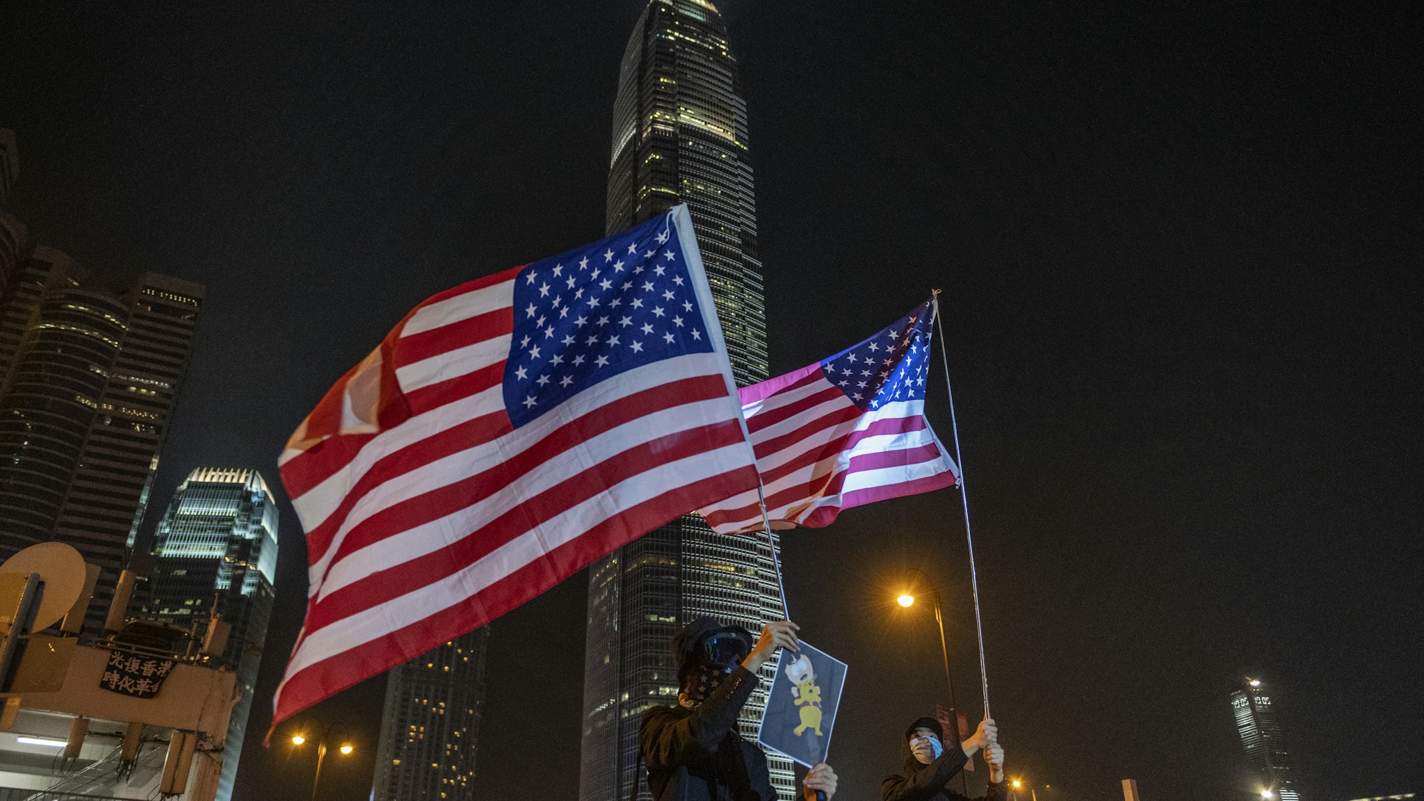 Protesters are seen waving US Flags during an anti-government Protest in Hong Kong, China, October 19, 2019. Pro-democracy Protesters have been taking to the streets in Hong Kong for months of the Government. (Photo by Vernon Yuen/NurPhoto via Getty Images)