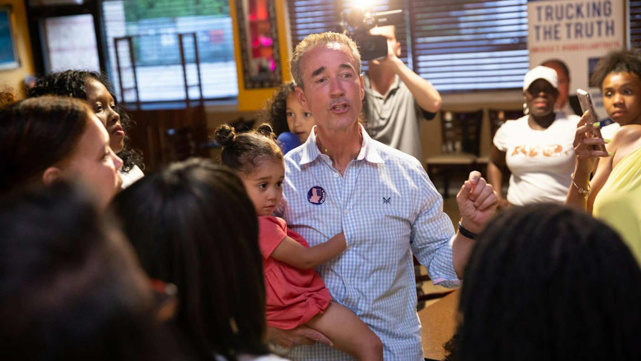 Virginia state senate candidate Joe Morrissey talks to supporters after winning the primary vote at Plaza Mexico Mexican Restaurant in Petersburg, VA on June 11, 2019.