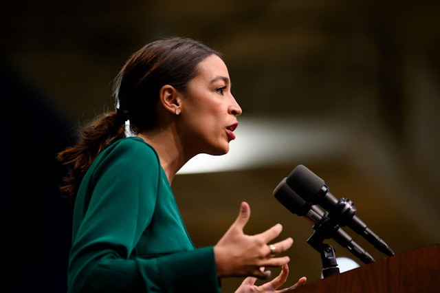 DES MOINES, IA - NOVEMBER 09: U.S. Rep. Alexandria Ocasio-Cortez (D-NY) takes the stage before speaking at the Climate Crisis Summit at Drake University on November 9, 2019 in Des Moines, Iowa. Ocasio-Cortez joined Democratic Presidential candidate Bernie Sanders (I-VT) to spoke about the current state of climate change in relation to U.S. policy.