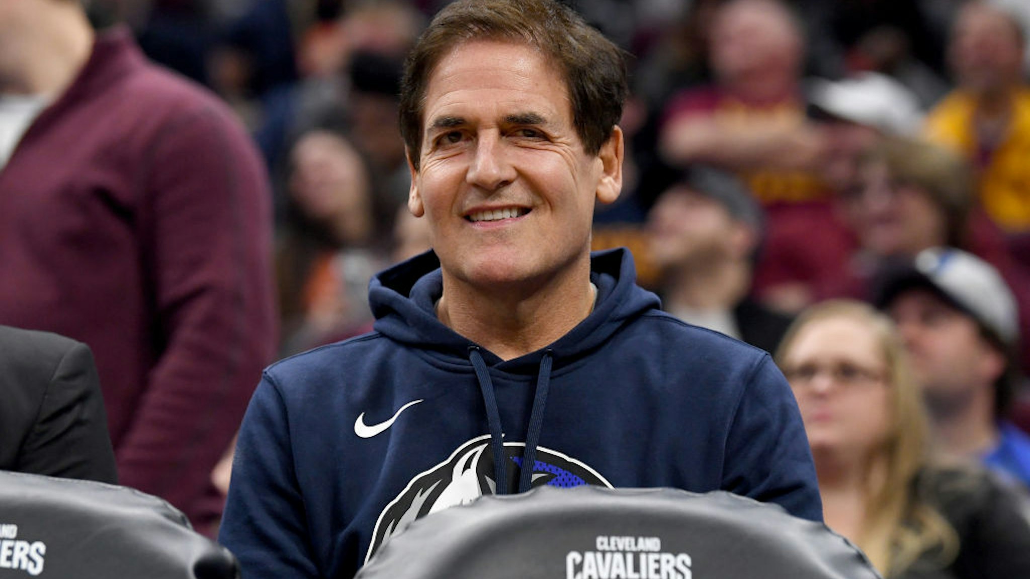 Mark Cuban owner of the Dallas Mavericks watches his team from the bench during the first half against the Cleveland Cavaliers at Rocket Mortgage Fieldhouse on November 03, 2019 in Cleveland, Ohio. NOTE TO USER: User expressly acknowledges and agrees that, by downloading and/or using this photograph, user is consenting to the terms and conditions of the Getty Images License Agreement.