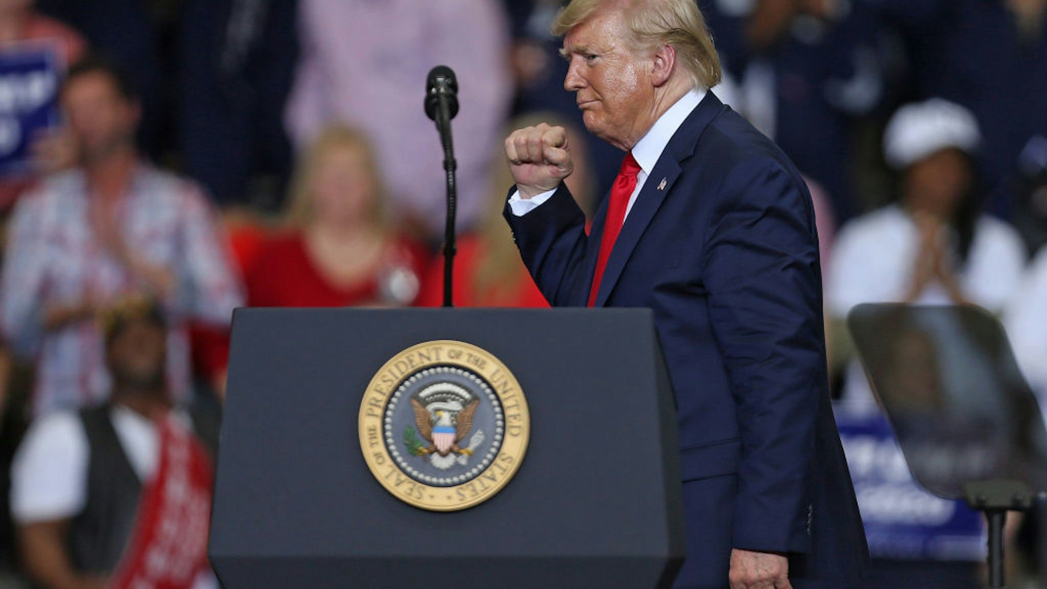 U.S. President Donald Trump gestures during a "Keep America Great" rally at the Monroe Civic Center on November 06, 2019 in Monroe, Louisiana. President Trump headlined the rally to support Louisiana Republican gubernatorial candidate Eddie Rispone, who is looking to unseat incumbent Democratic Gov. John Bel Edwards.