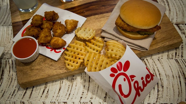 Chicken nuggets, french fries, and a fried chicken sandwich are arranged for a photograph during an event ahead of the grand opening for a Chick-fil-A restaurant in New York, U.S., on Friday, Oct. 2, 2015.