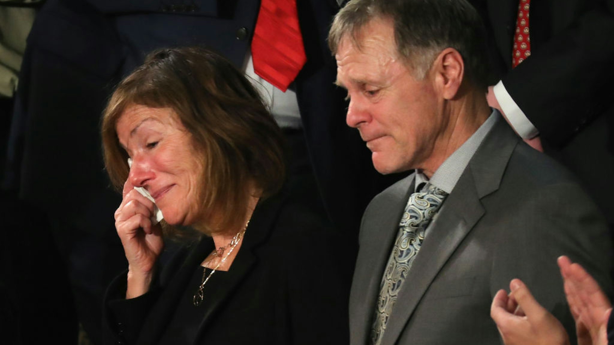 Parents of Otto Warmbier, Fred and Cindy Warmbier are acknowledged during the State of the Union address in the chamber of the U.S. House of Representatives January 30, 2018 in Washington, DC.
