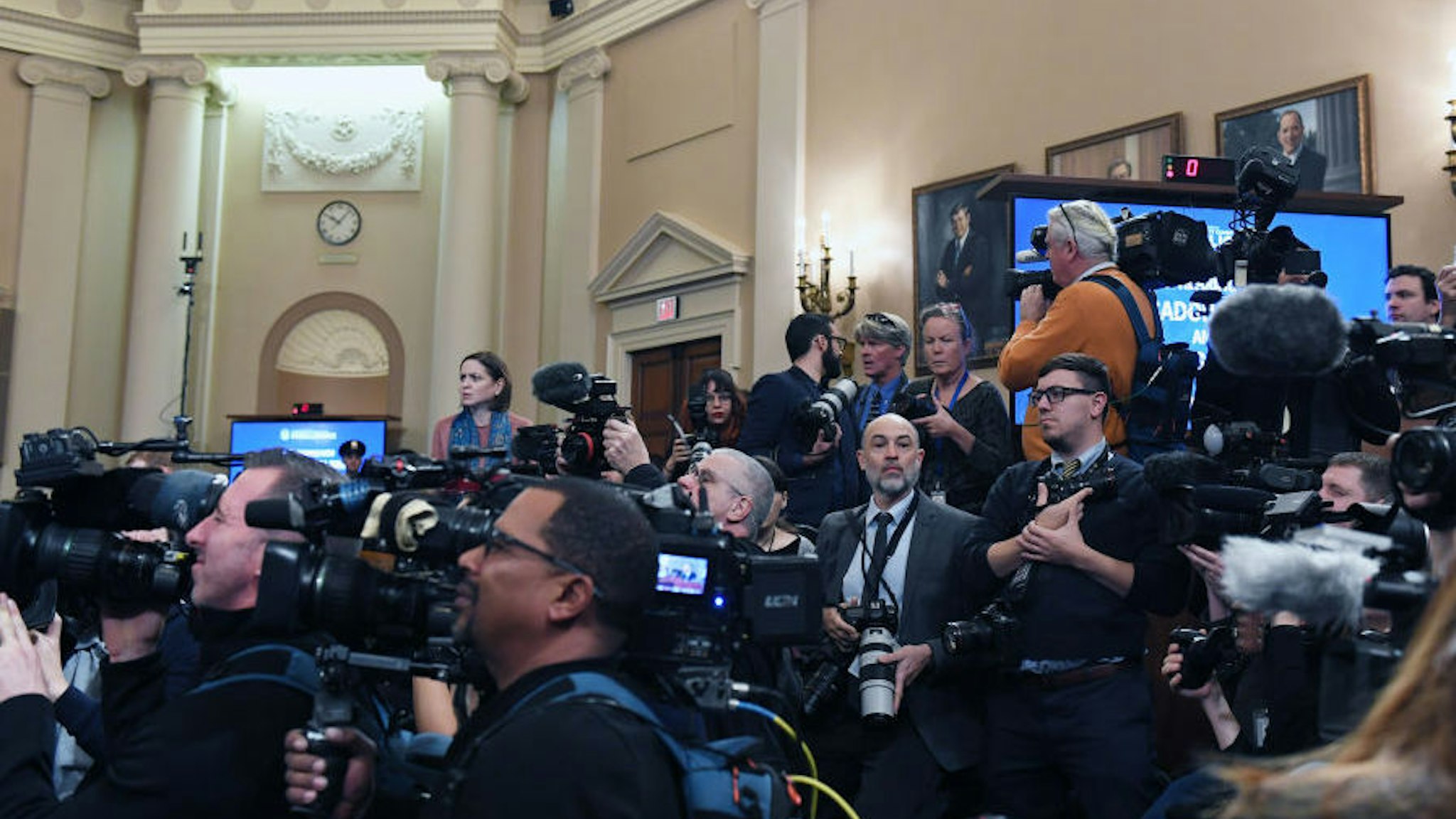 WASHINGTON, DC - NOVEMBER 13: Media members gather as State Department deputy assistant secretary, George Kent and acting U.S. ambassador to Ukraine, William B. Taylor appear for a House Intelligence Committee impeachment hearing in the Longworth House Office Building on Wednesday November 13, 2019 in Washington, DC.