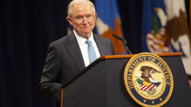 Jeff Sessions speaks during a farewell ceremony for Rod Rosenstein
