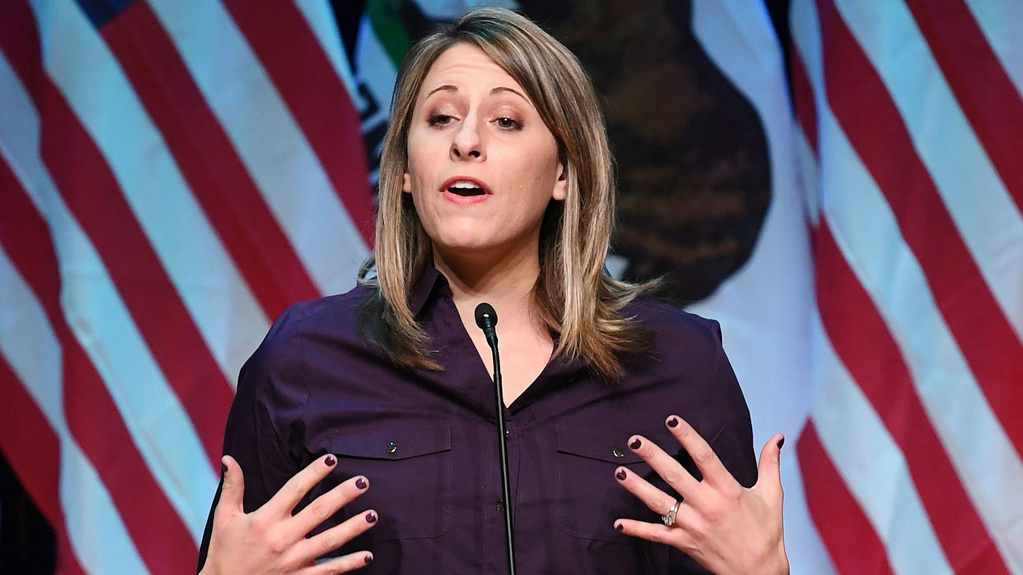 Democrat Katie Hill who is running for Congress in California's 25th District, speaks at a campaign rally before the mid-term elections in Santa Clarita, California on November 3, 2018. - She will run against Republican incumbent Steve Knight