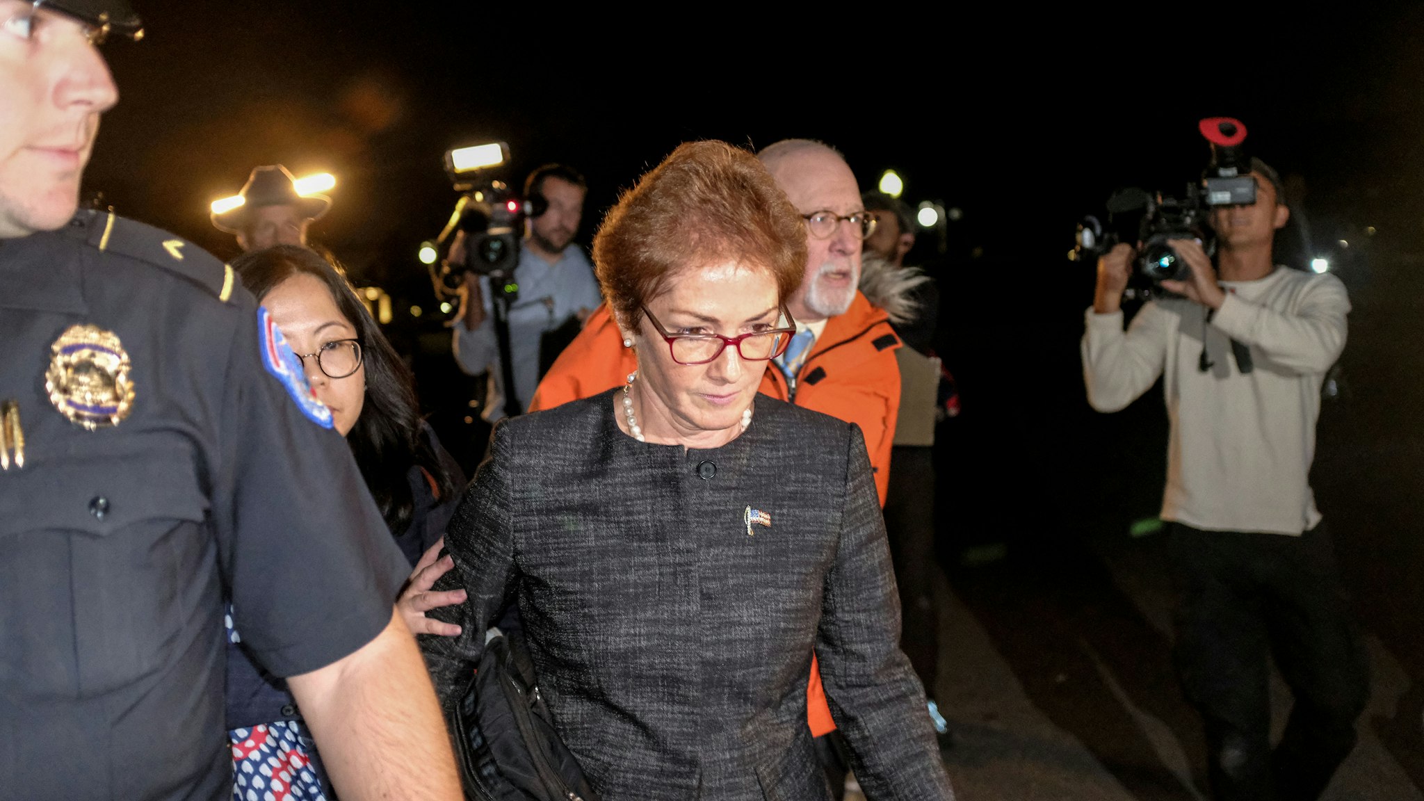 Marie Yovanovitch, former U.S. Ambassador to Ukraine, center, leaves Capitol Hill after a closed-door deposition before House committees in Washington, D.C., U.S., on Friday, Oct. 11, 2019. Yovanovitch told House impeachment investigators Friday she was ousted after a "concerted campaign" by President Donald Trump and his allies, including Rudy Giuliani.