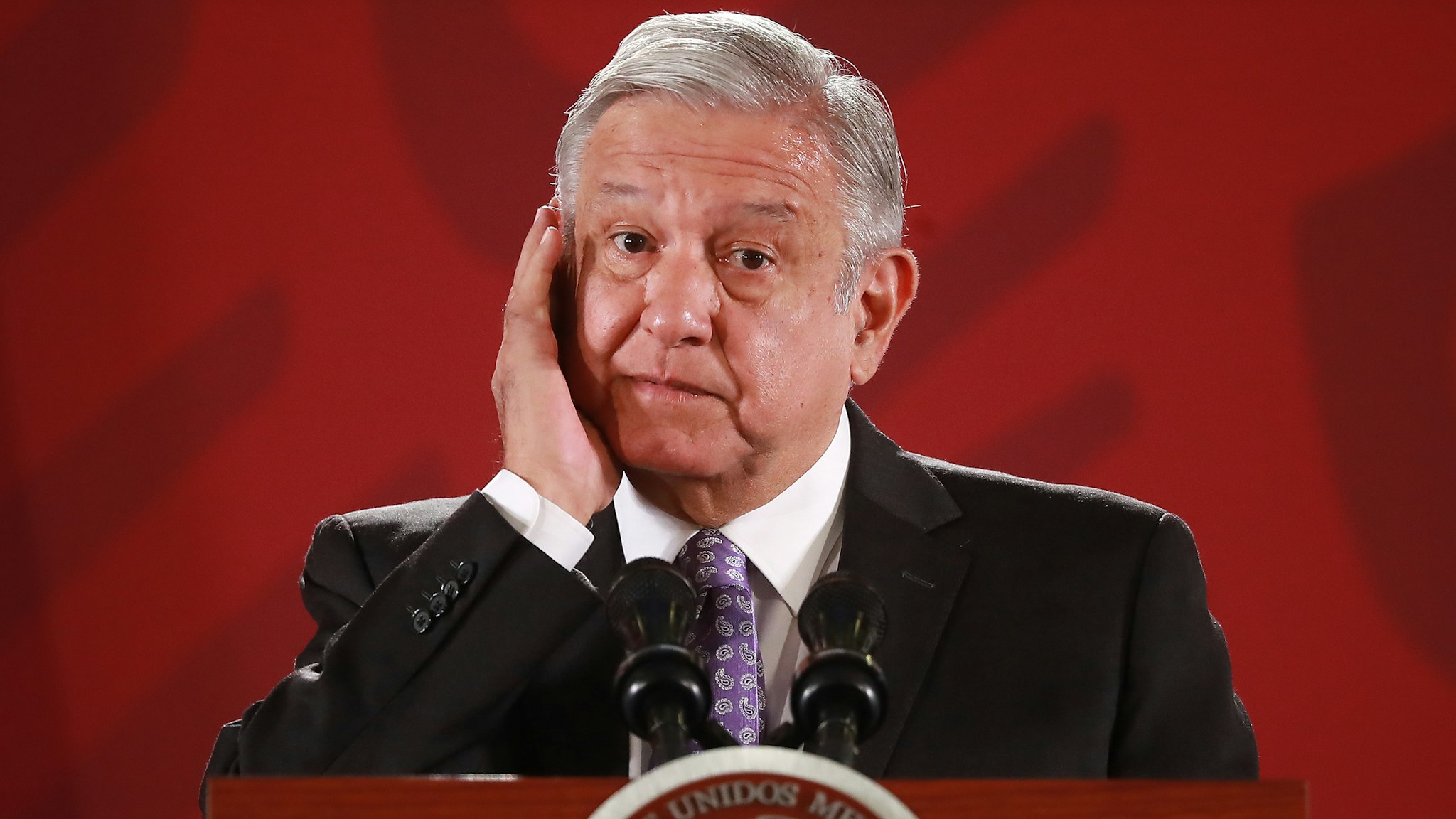 President of Mexico Andres Manuel Lopez Obrador gestures during the Presidential Daily Morning Briefing on November 13, 2019 in Mexico City, Mexico. Lopez Obrador gave details about the asylum granted to Former President of Bolivia Evo Morales Ayma after Mexican government acknowledged a coup and demanded respect for the constitution and democracy in Bolivia.