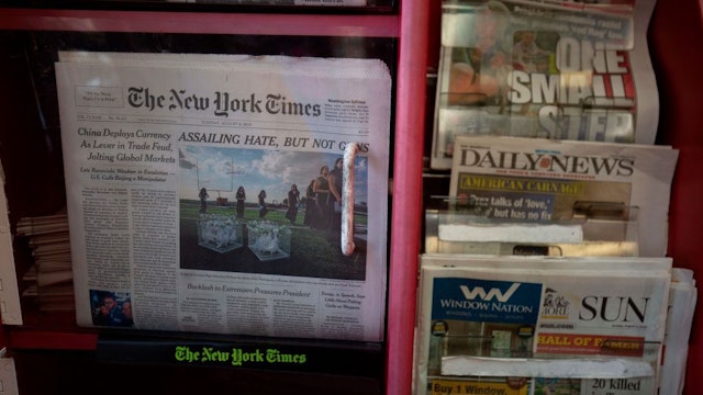 The front pages of The New York Times, New York Post, New York Daily News and Baltimore Sun newspapers are seen at a convenience store in Washington, DC, on August 6, 2019. (Photo by Alastair Pike / AFP) (Photo credit should read ALASTAIR PIKE/AFP via Getty Images)