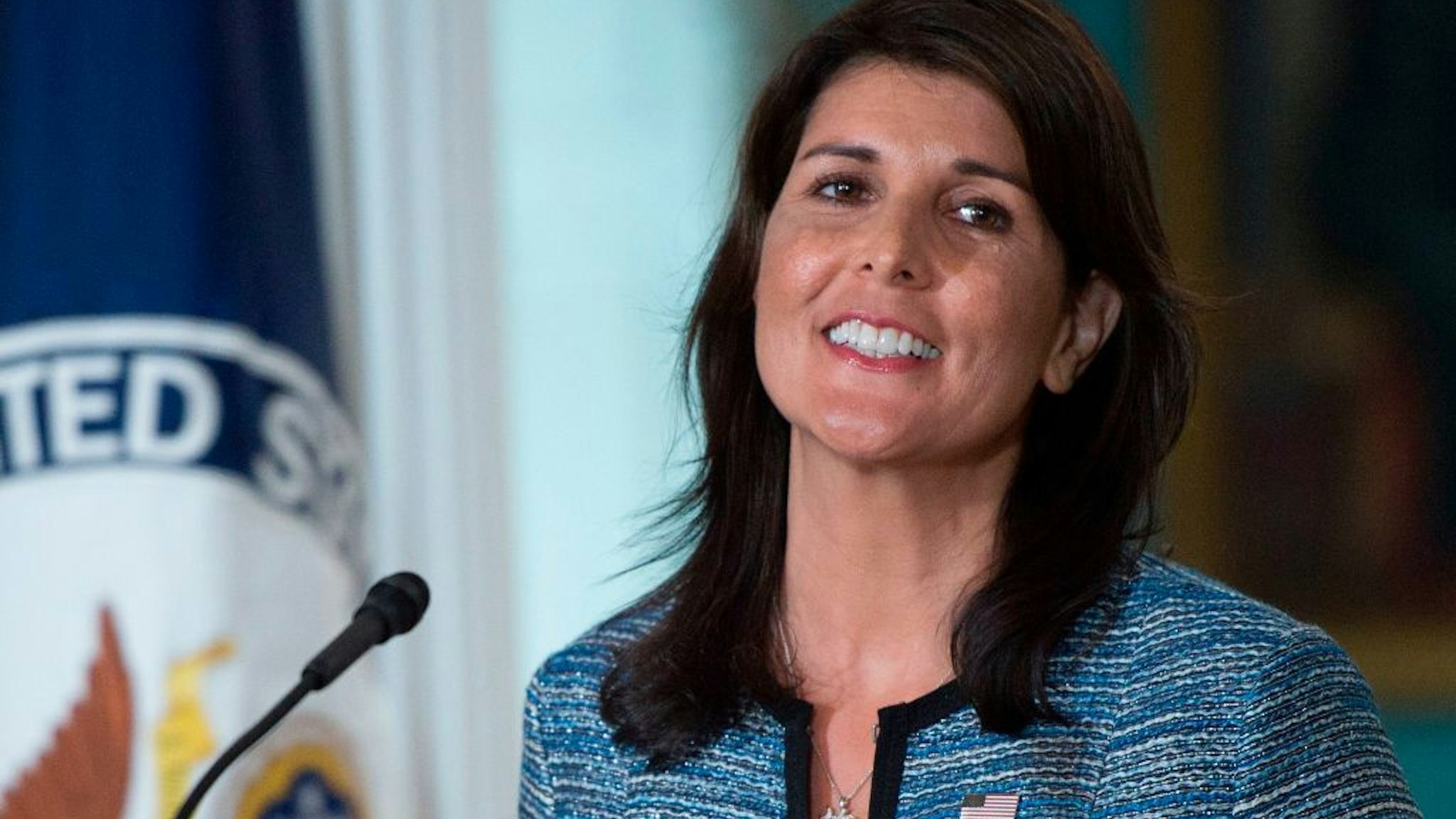 US Ambassador to the United Nation Nikki Haley smiles at the US Department of State in Washington DC on June 19, 2018. - The United States announced that it is withdrawing from the UN Human Rights Council. (Photo by Andrew CABALLERO-REYNOLDS / AFP) (Photo credit should read ANDREW CABALLERO-REYNOLDS/AFP via Getty Images)